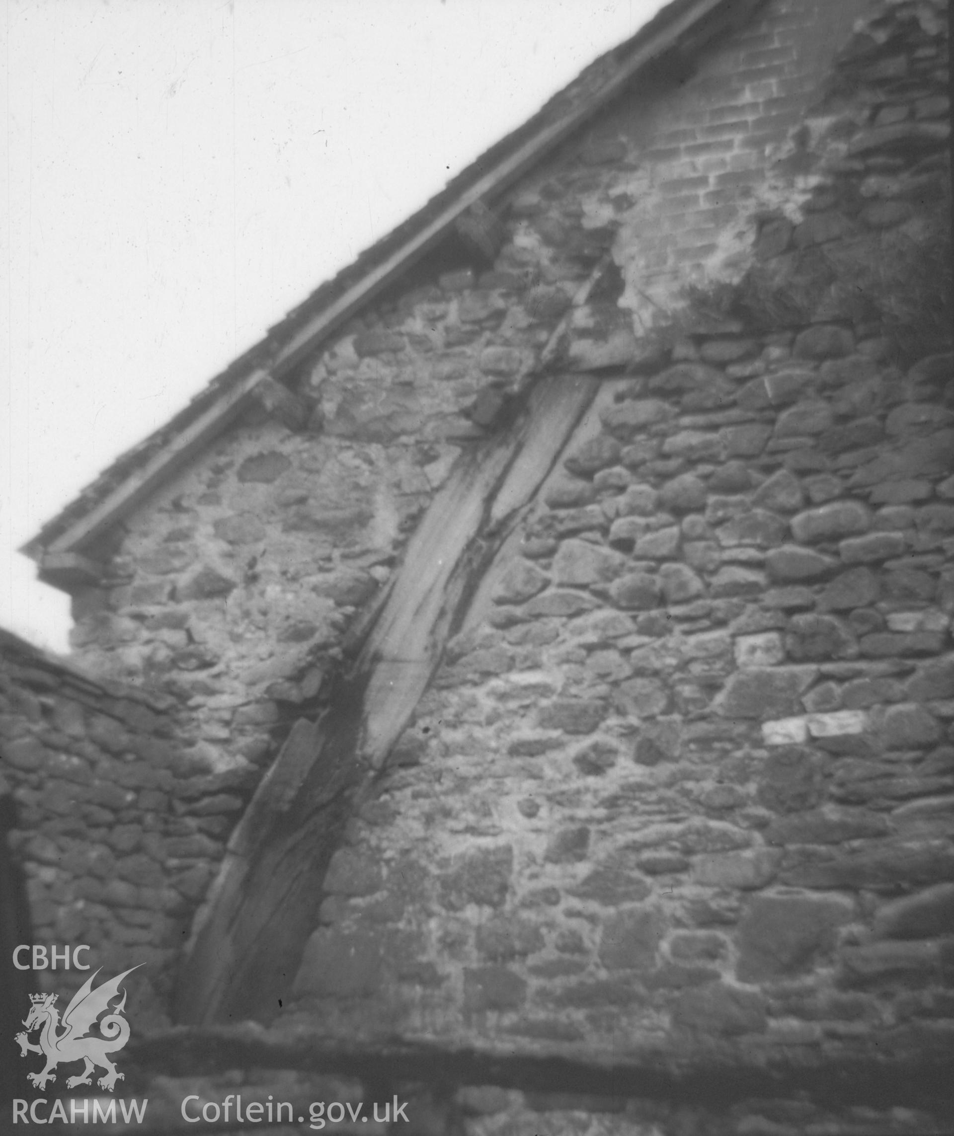 Copy transparency of black and white historic print of exterior timber detail at Ty'n y Beili, Llanafan Fawr. From an original held at Brecon Museum, undated.