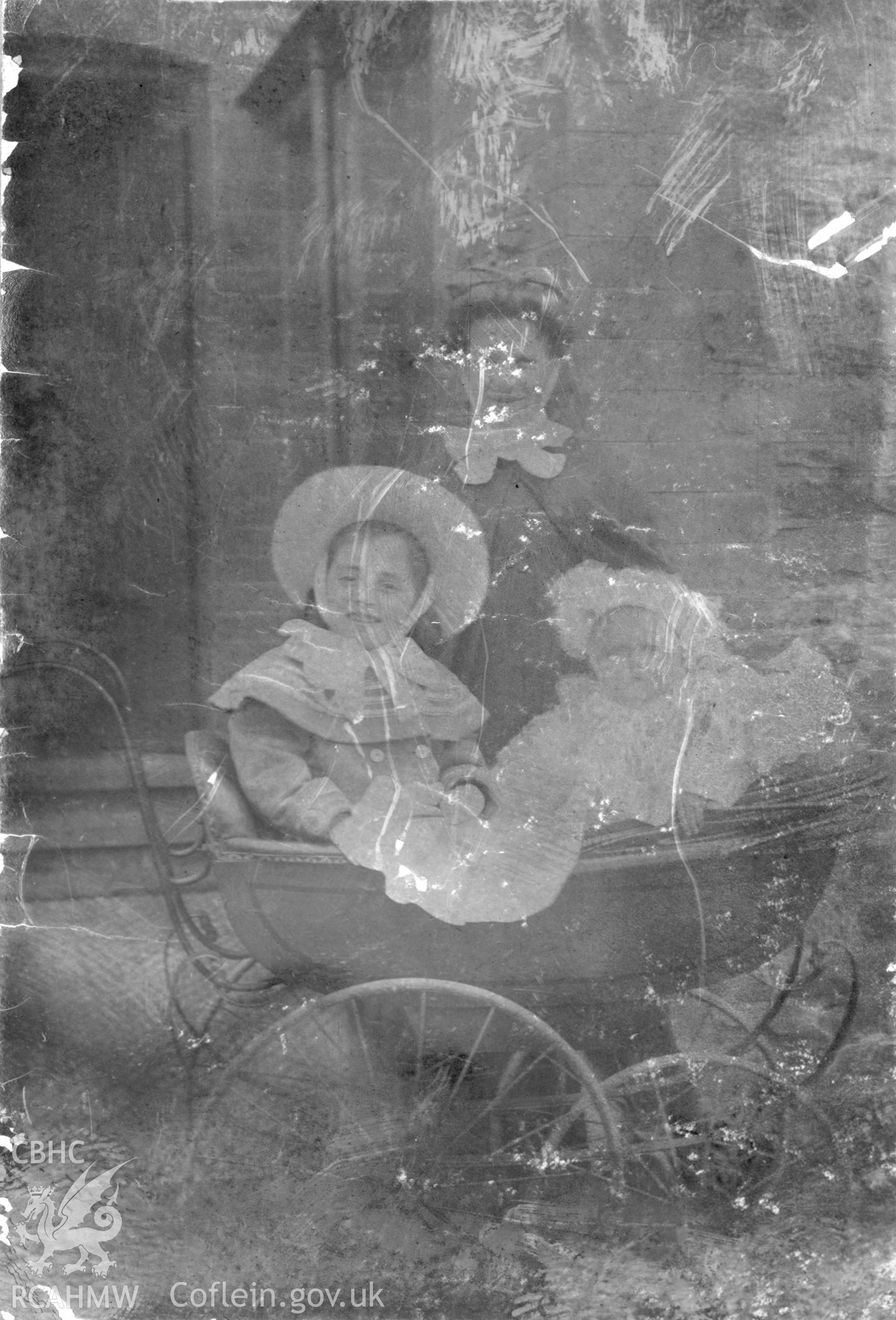 "1906" Photo of three children. Digitised from a photograph album showing views of Aberystwyth and District, produced by David John Saer, school teacher of Aberystwyth. Loaned for copying by Dr Alan Chamberlain.