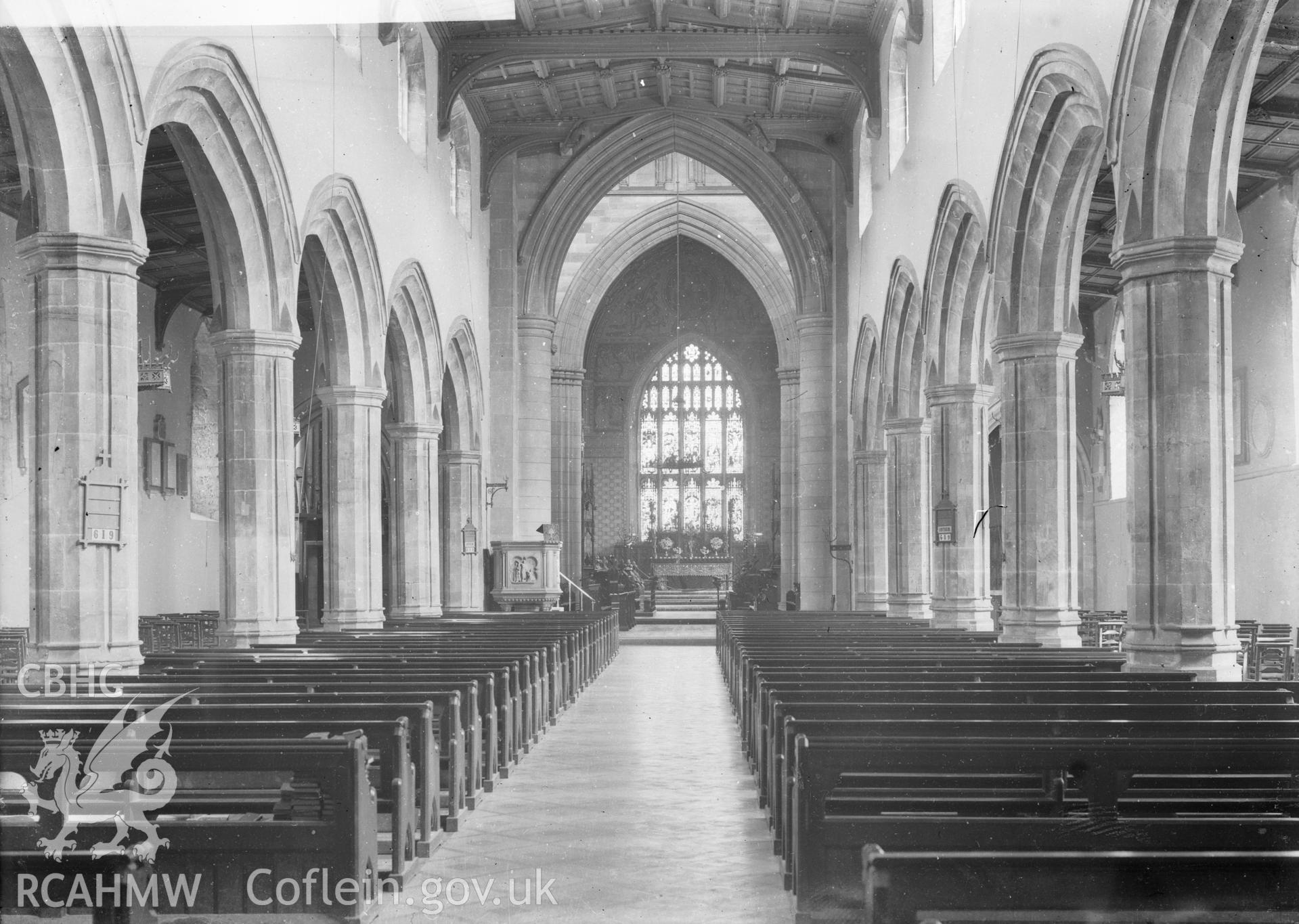 Black and white acetate negative, a copy of a glass plate showing interior of Bangor Cathedral, looking down the nave.