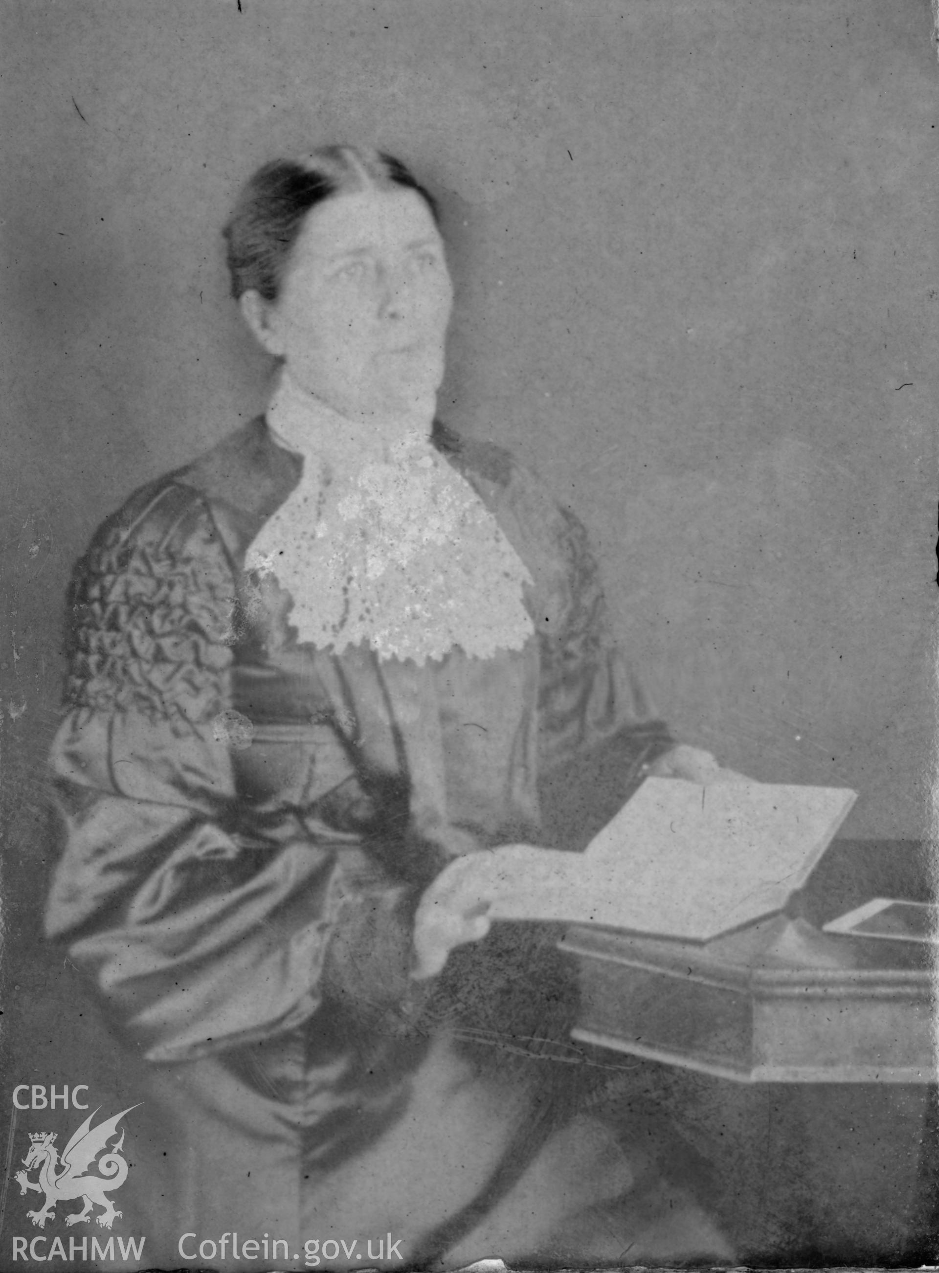 Portrait of a seated adult. Digitised from a photograph album showing views of Aberystwyth and District, produced by David John Saer, school teacher of Aberystwyth. Loaned for copying by Dr Alan Chamberlain.