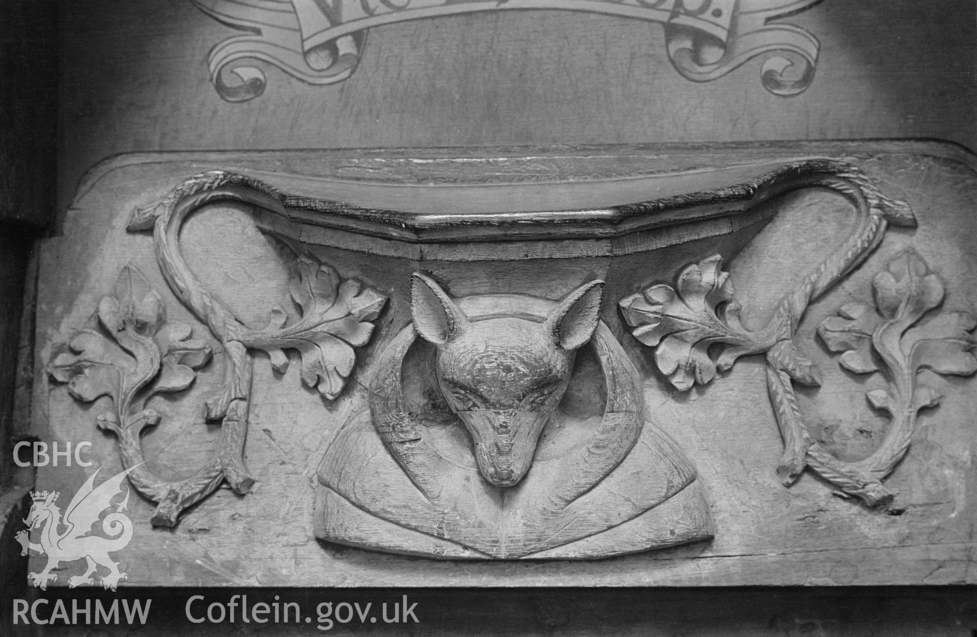 Black and white nitrate negative showing misericord at St David's Cathedral.