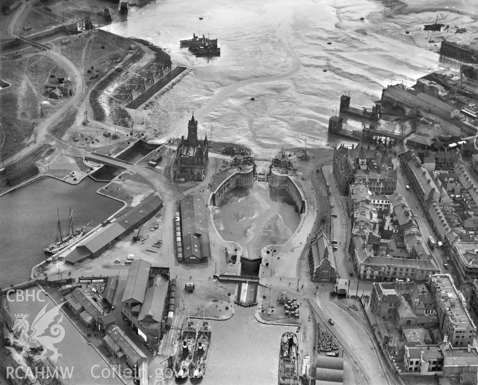 Black and white oblique aerial photograph showing Cardiff Docks from Aerofilms album no W22, taken by Aerofilms Ltd and dated 1929.