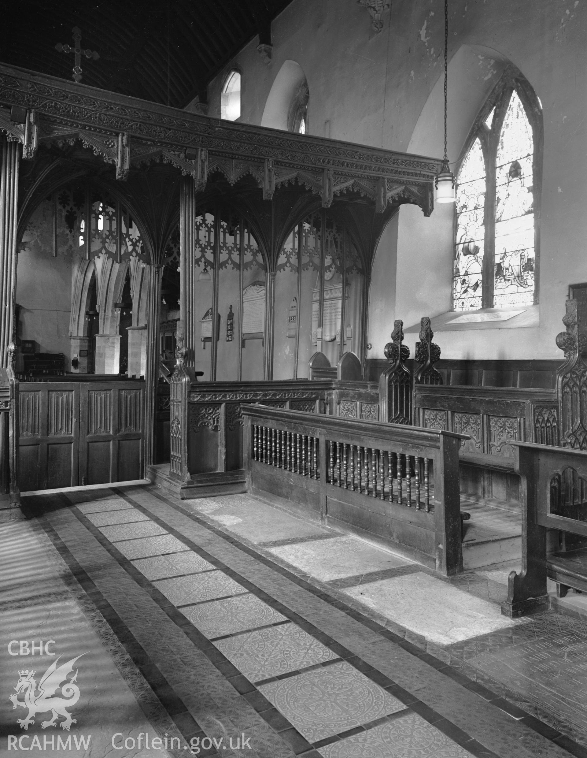 Interior view of St Marys Church Conwy showing screen and benches, taken in 10.09.1951.