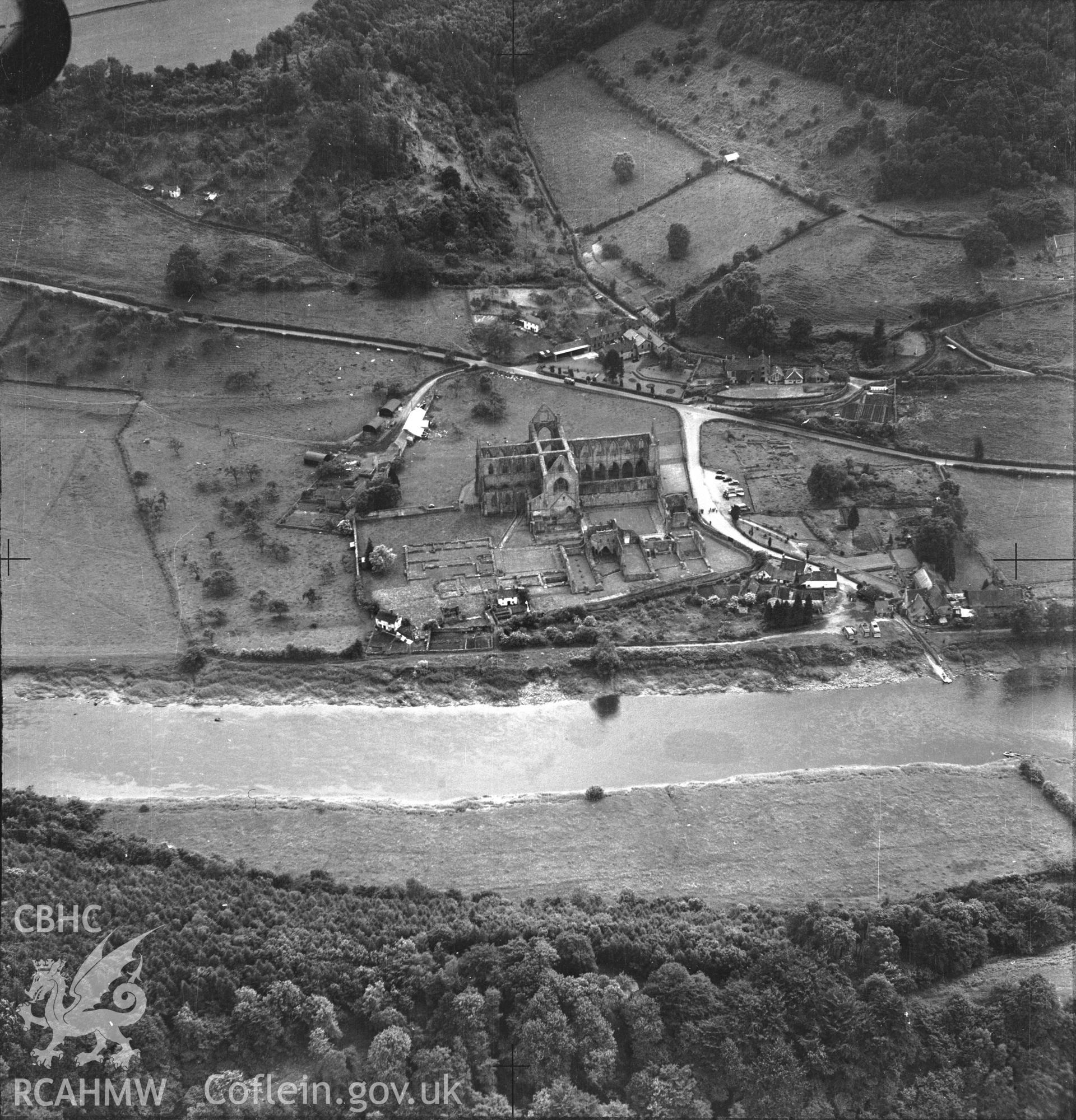 D.O.E. black and white negative of Tintern Abbey: from the air.