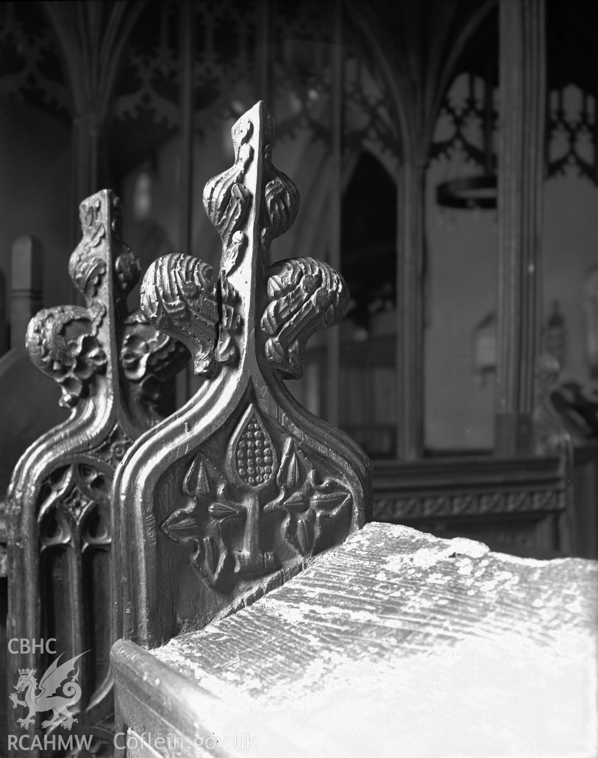 Interior view of St Marys Church Conwy showing bench end carvings, taken in 10.09.1951.