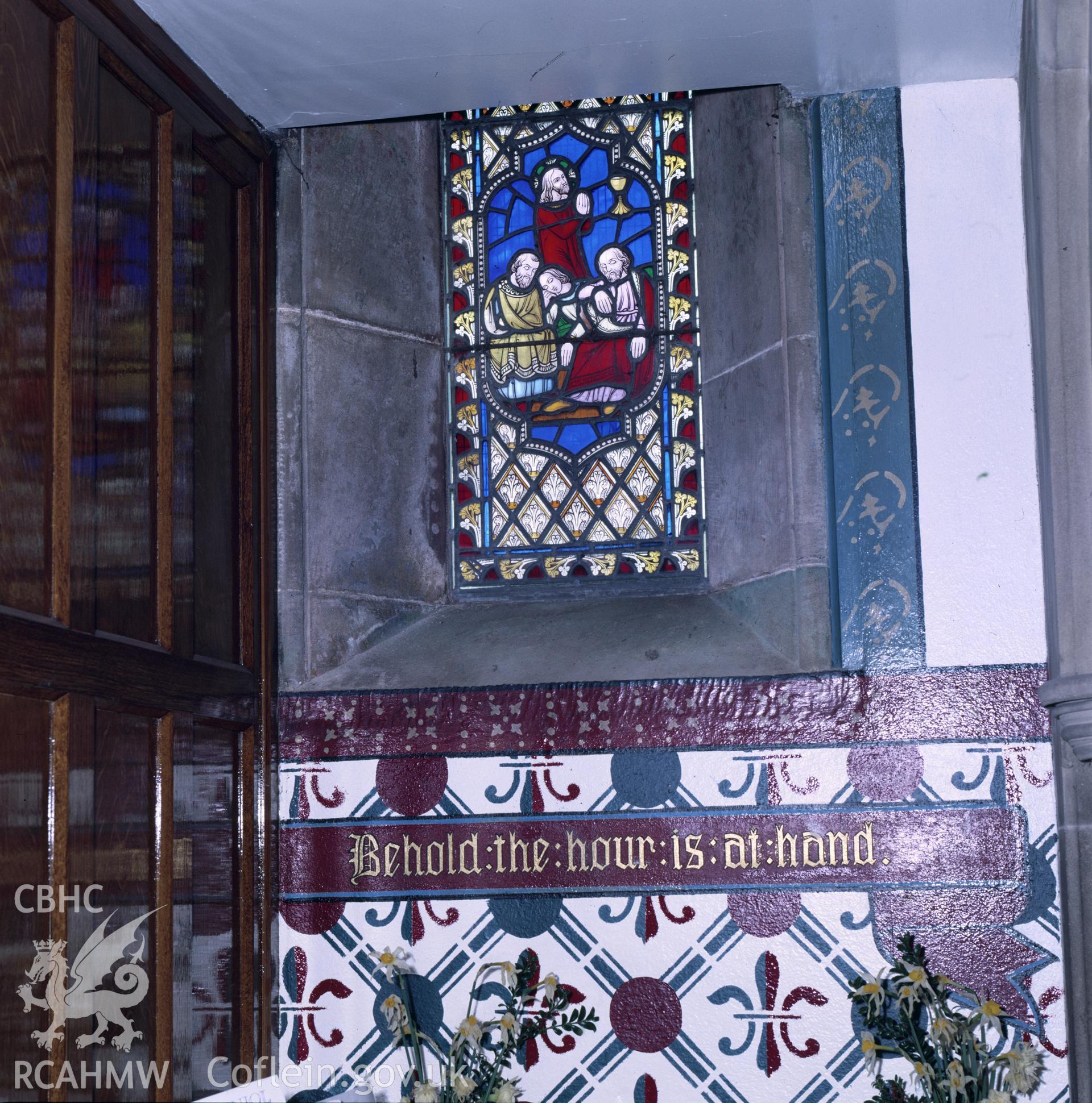 RCAHMW colour transparency showing stained glass at St John's Church, Penymynydd taken by A.J. Parkinson, 1987.