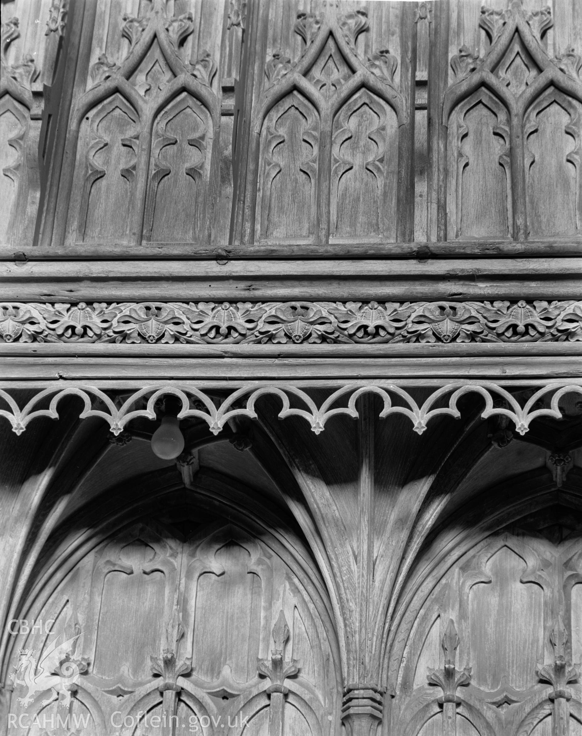 Interior view showing detail of canopy on church stalls.