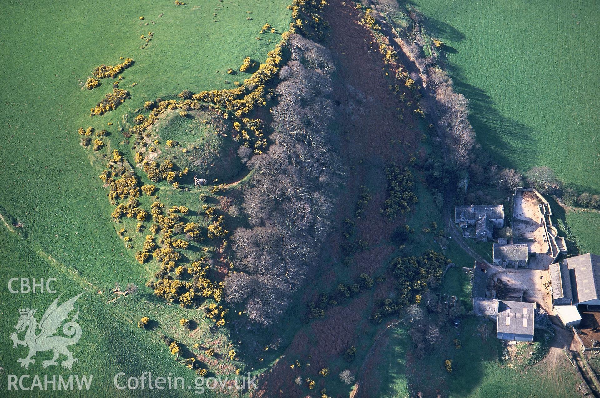 Slide of RCAHMW colour oblique aerial photograph of Bryn-y-castell, Motte, taken by C.R. Musson, 25/3/1993.