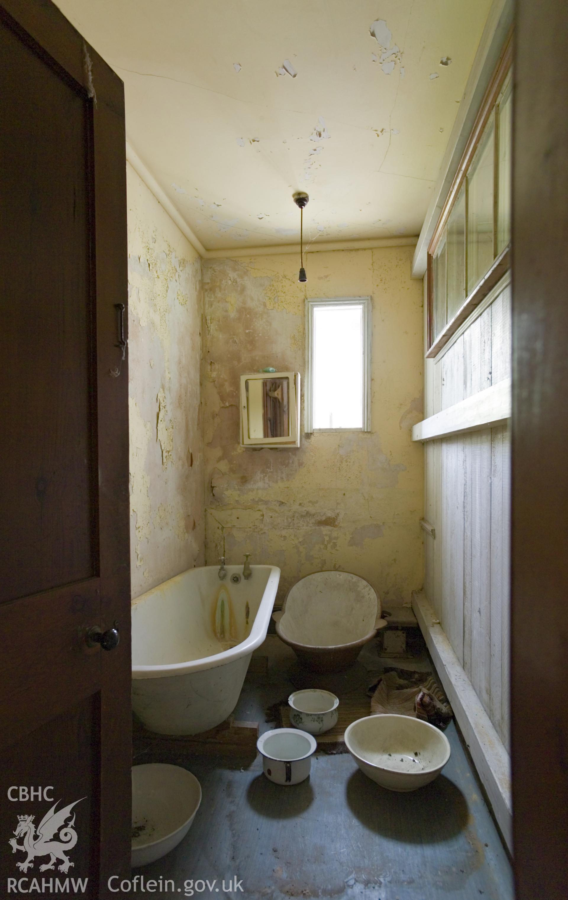 Bathroom divided from servants quarters.