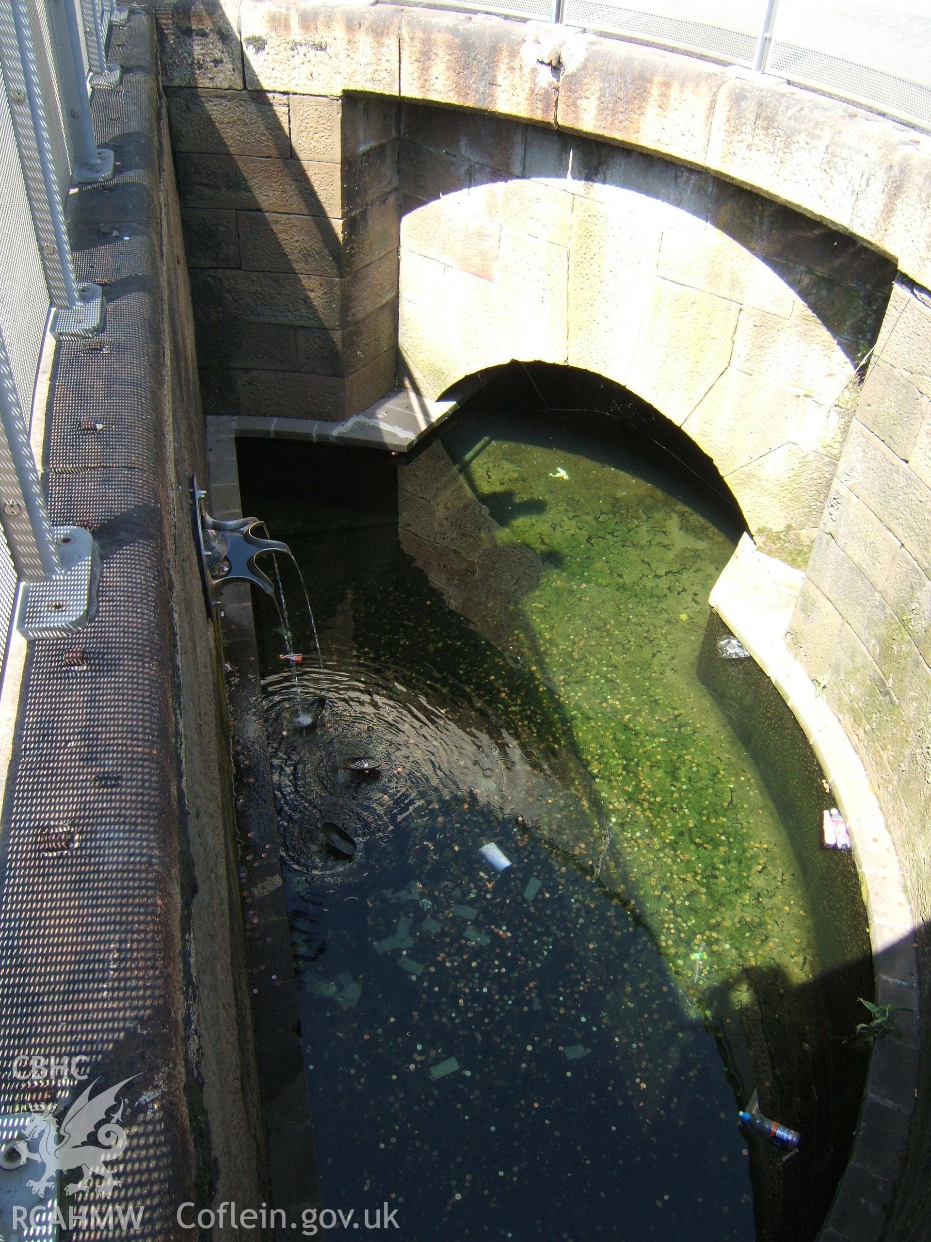 Ground sluice culverts of former Bute West Dock sea-lock retained as pond to south-west of main centre entrance.