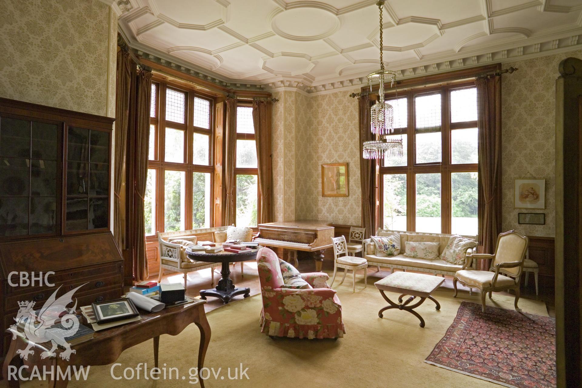 Interior of drawing room, corner windows.