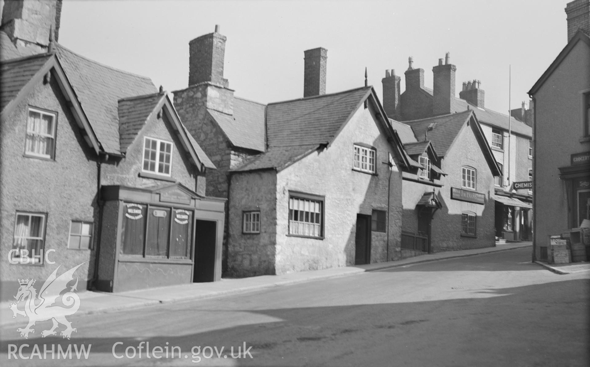 One black and white photograph of nos 20-26, Clwyd Street, Ruthin.