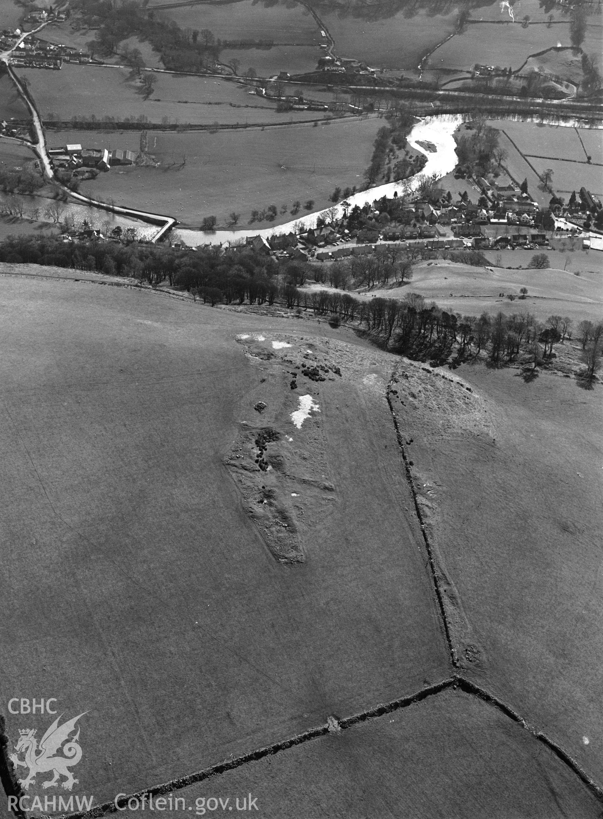 RCAHMW black and white oblique aerial photograph of Carrog Bridge, Earthwork and landscape. Taken by C R Musson on 13/03/1995
