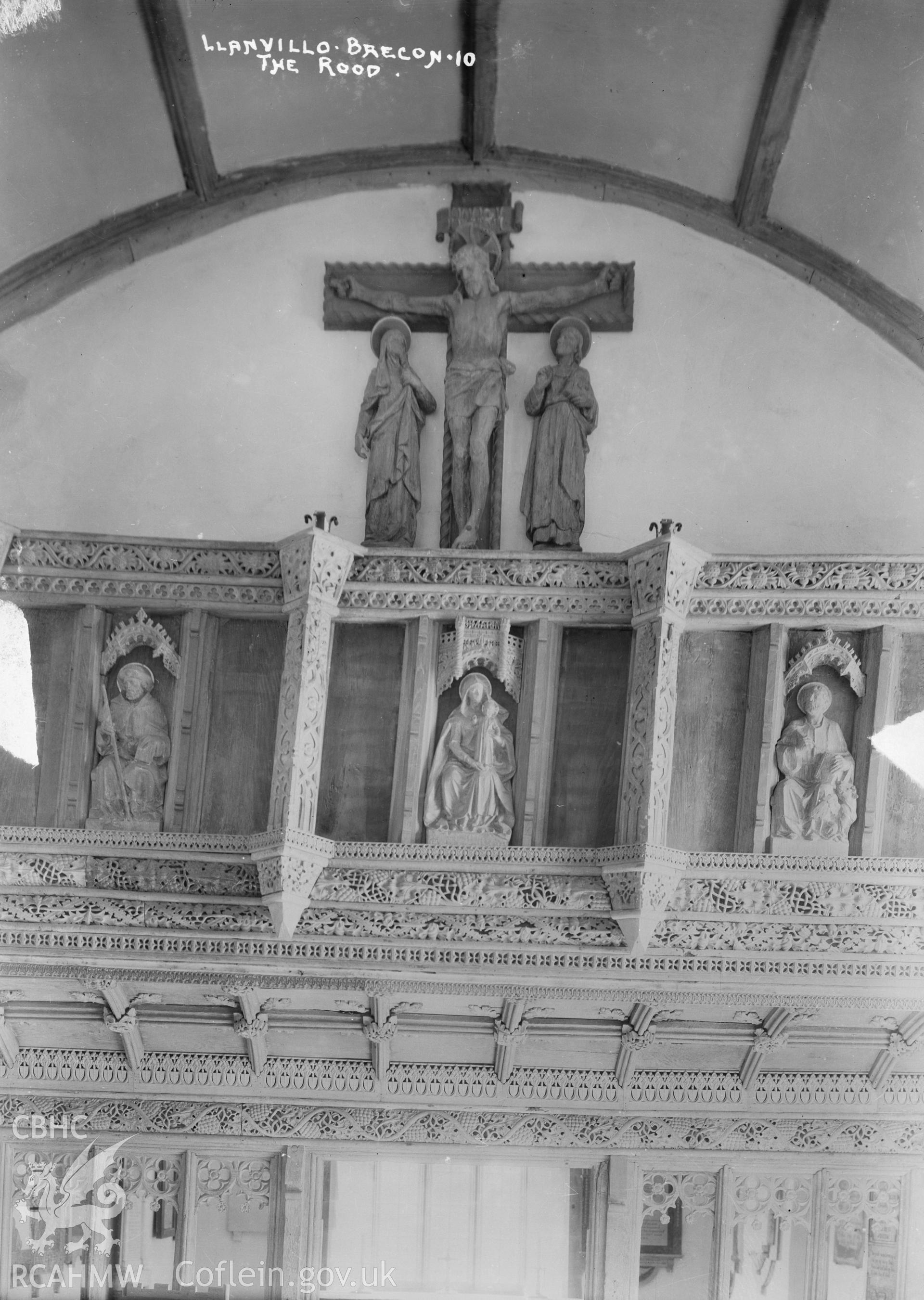 View of the rood screen in Llanfilo Church, taken by W A Call circa 1920.
