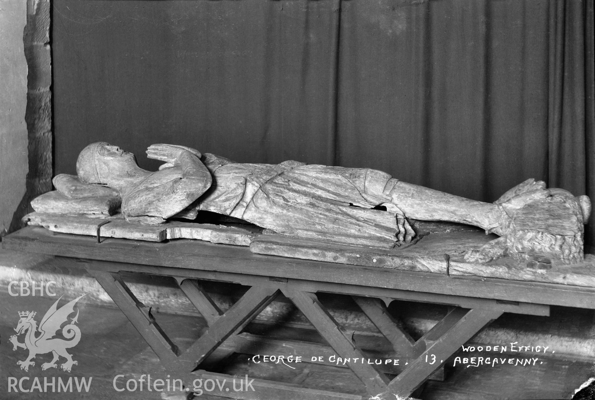 Interior view of St Mary's Church Abergavenny showing the wooden effigy of George de Cantaloupe, taken by W A Call.