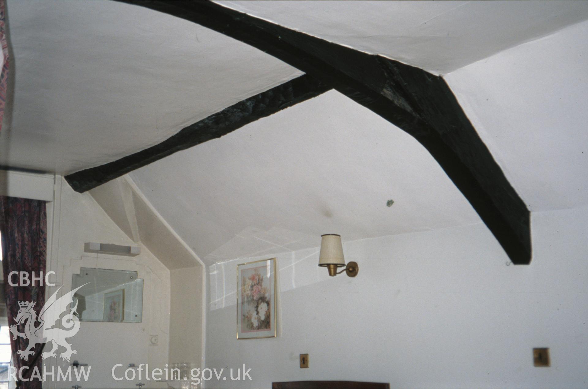 Interior view showing arched collar truss to the room above the porch.