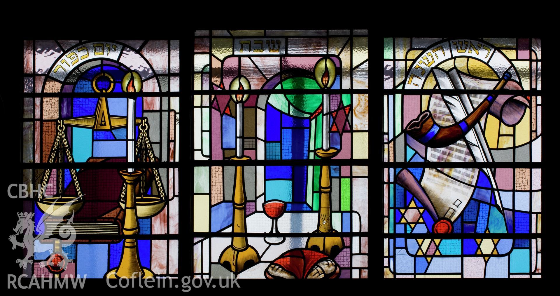 Stained glass window in east wall.