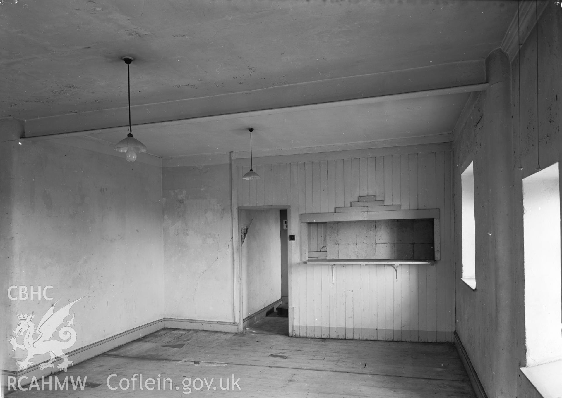 D.O.E photograph of Flint Gaol - first floor, back room, looking north west. In castle outer ward (since removed).