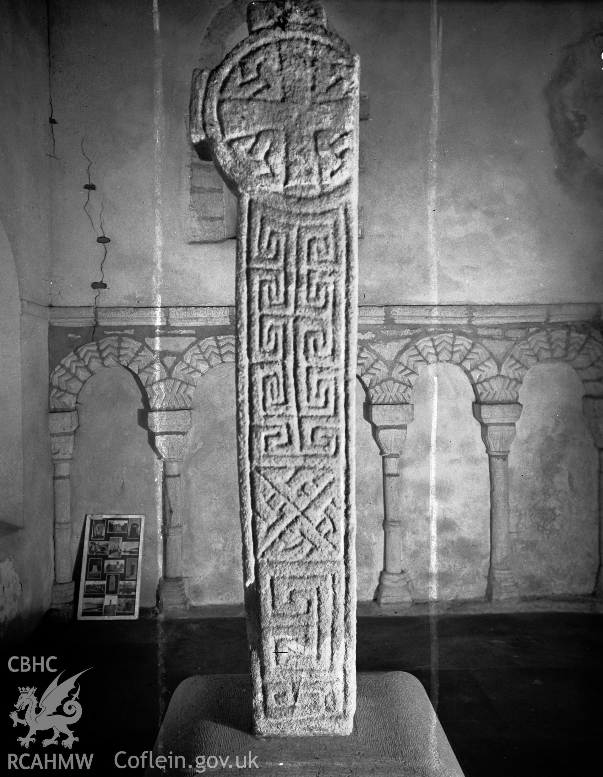 Penmon Cross inside the priory church.