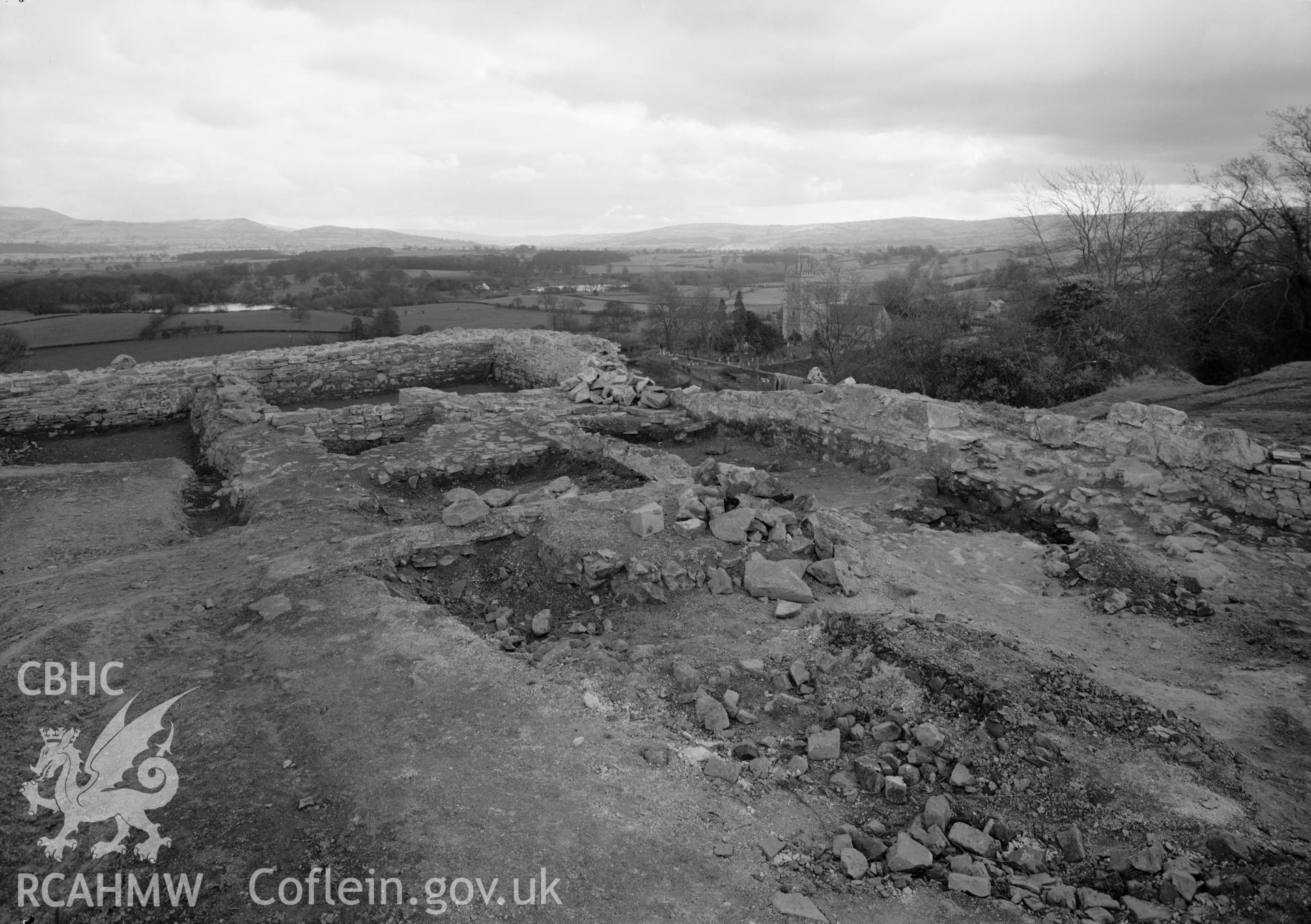 D.O.E photograph of Montgomery Castle - middle ward, buildings underlying Herbert House (partially excavated).