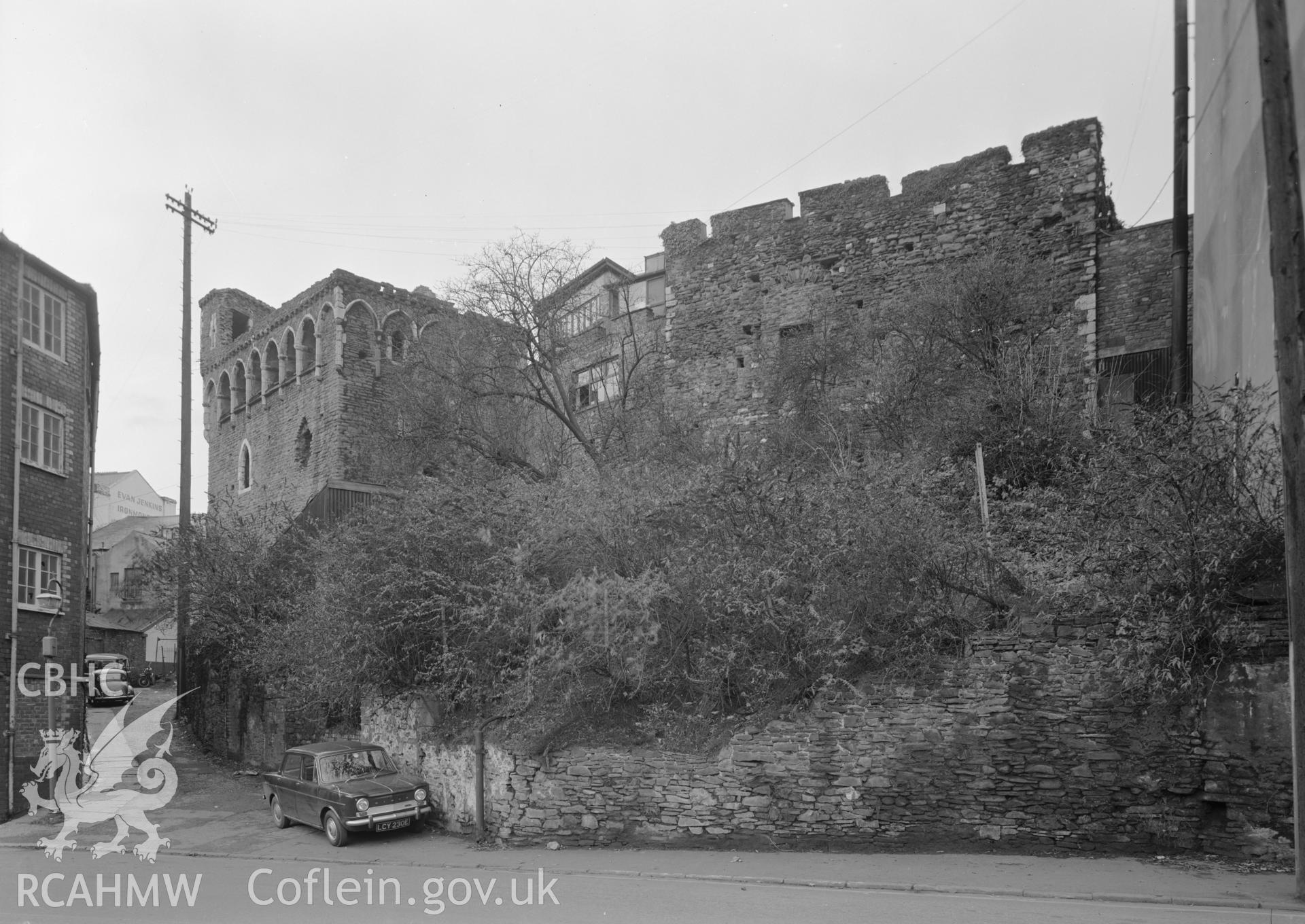 D.O.E photograph of Swansea Castle - north east tower and north curtain before clearance.