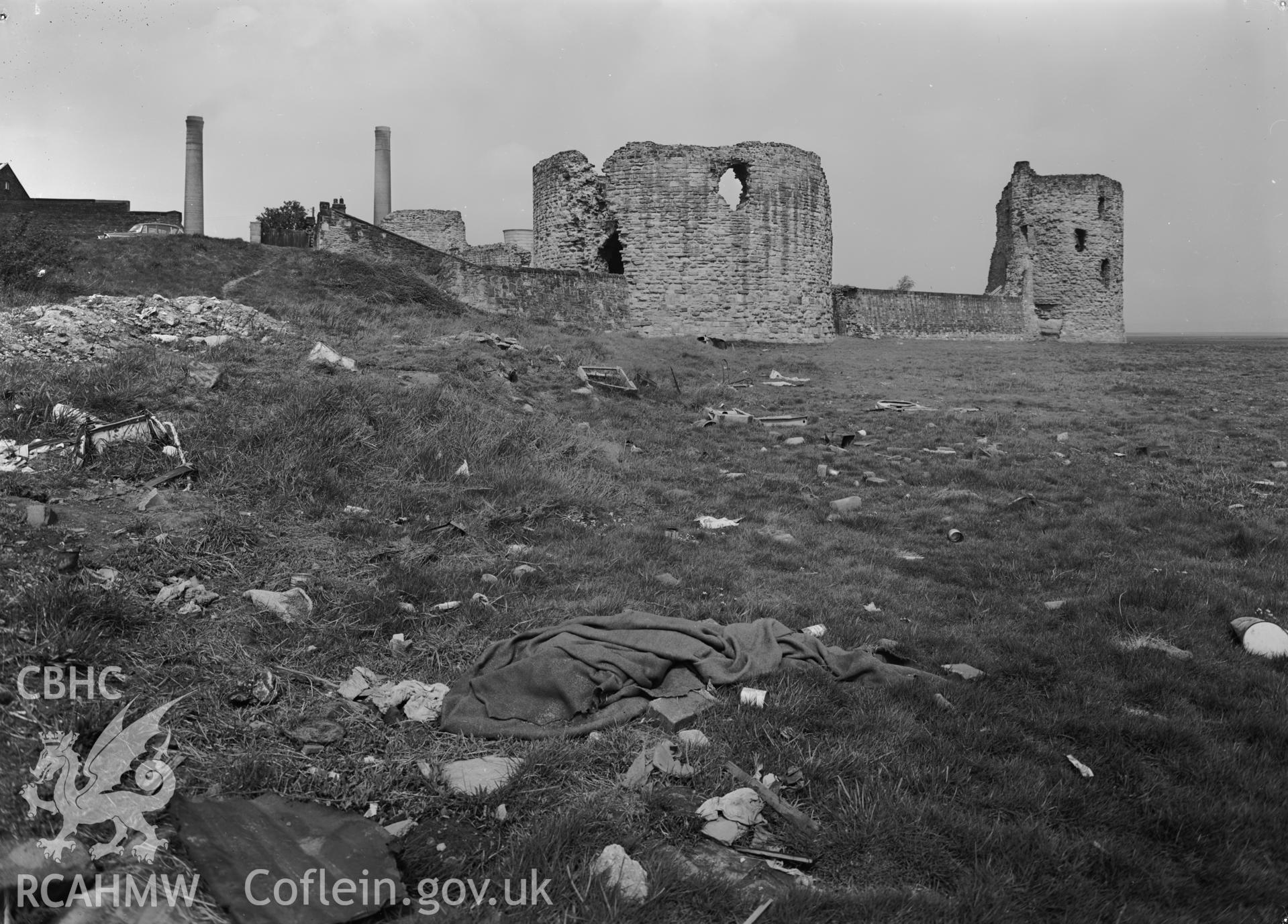 D.O.E photograph of Flint Gaol - view of castle from south east showing rubbish on bank and saltings. In castle outer ward (since removed).