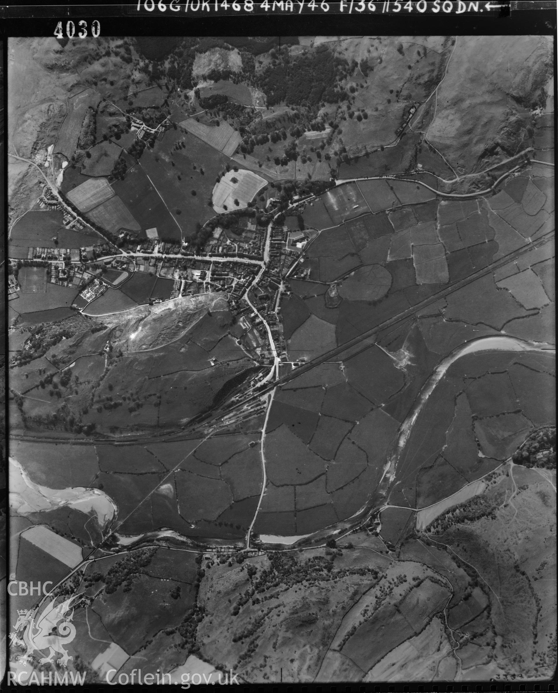 Black and white vertical aerial photograph taken by the RAF on 04/05/1946 centred on SH74410107 at a scale of 1:10000. The photograph includes part of Machynlleth community in Powys.