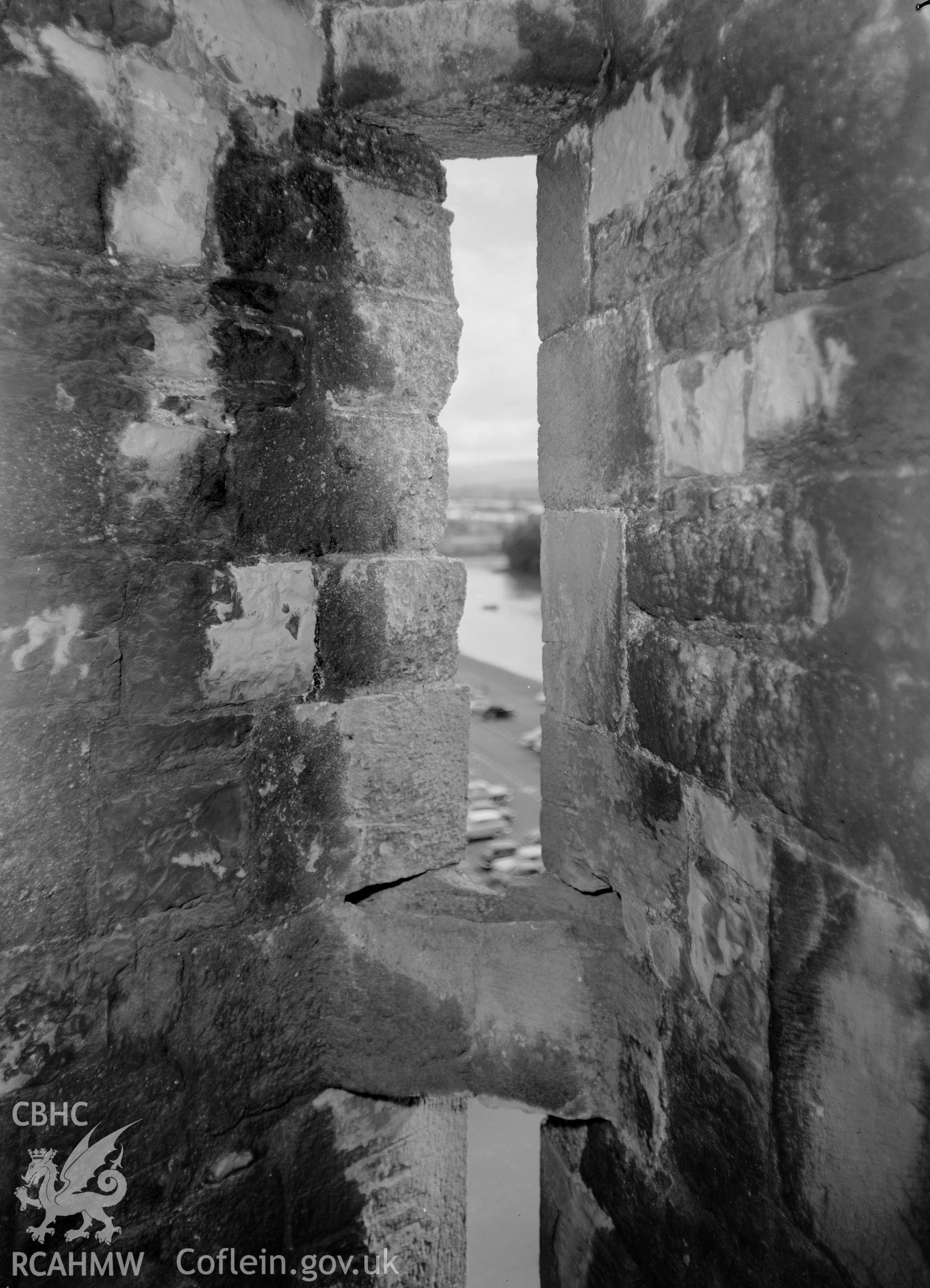 D.O.E photograph of Caernarfon Castle - arrow loop on south front.