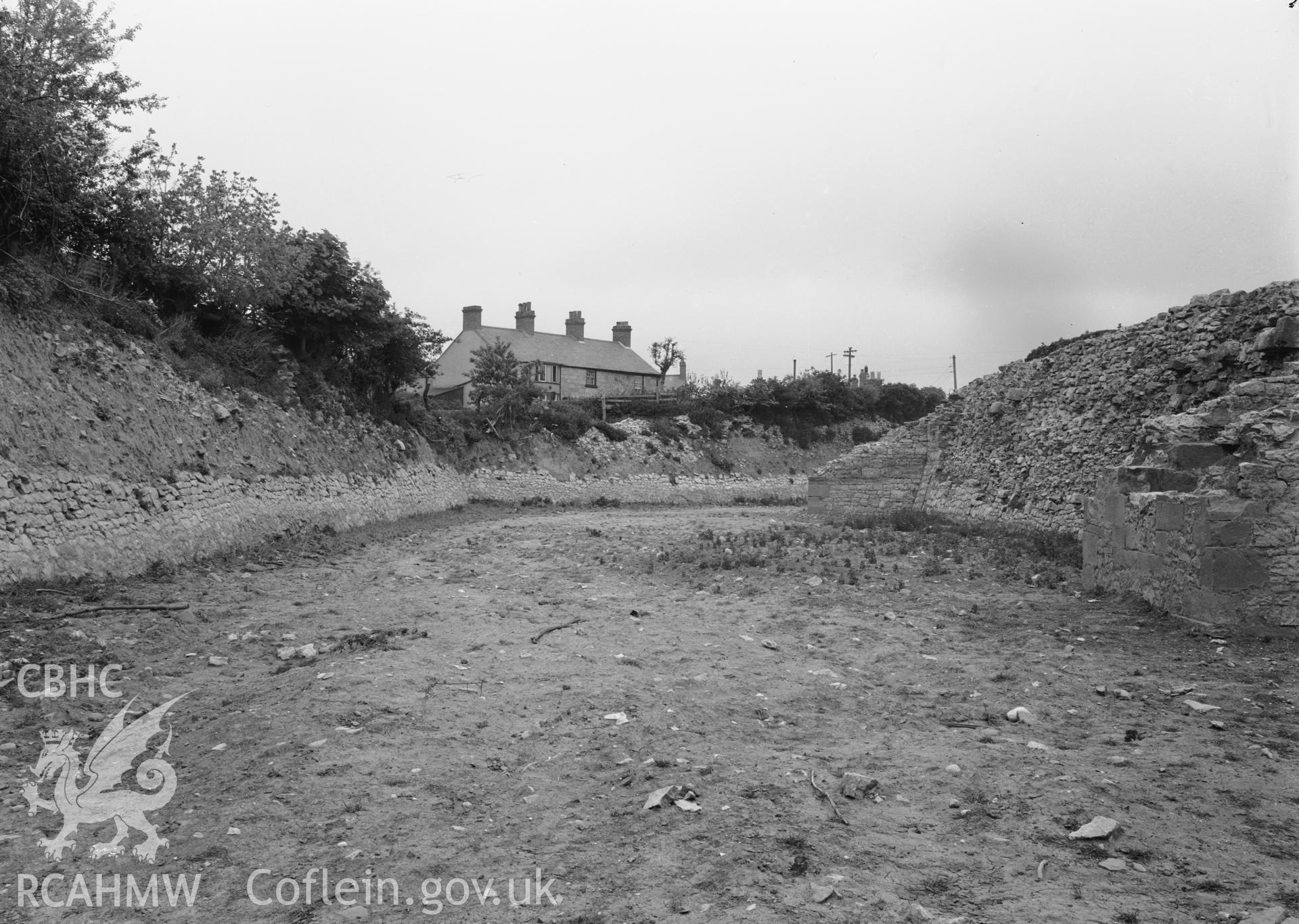 D.O.E photograph of Rhuddlan Castle. Moat excavations.