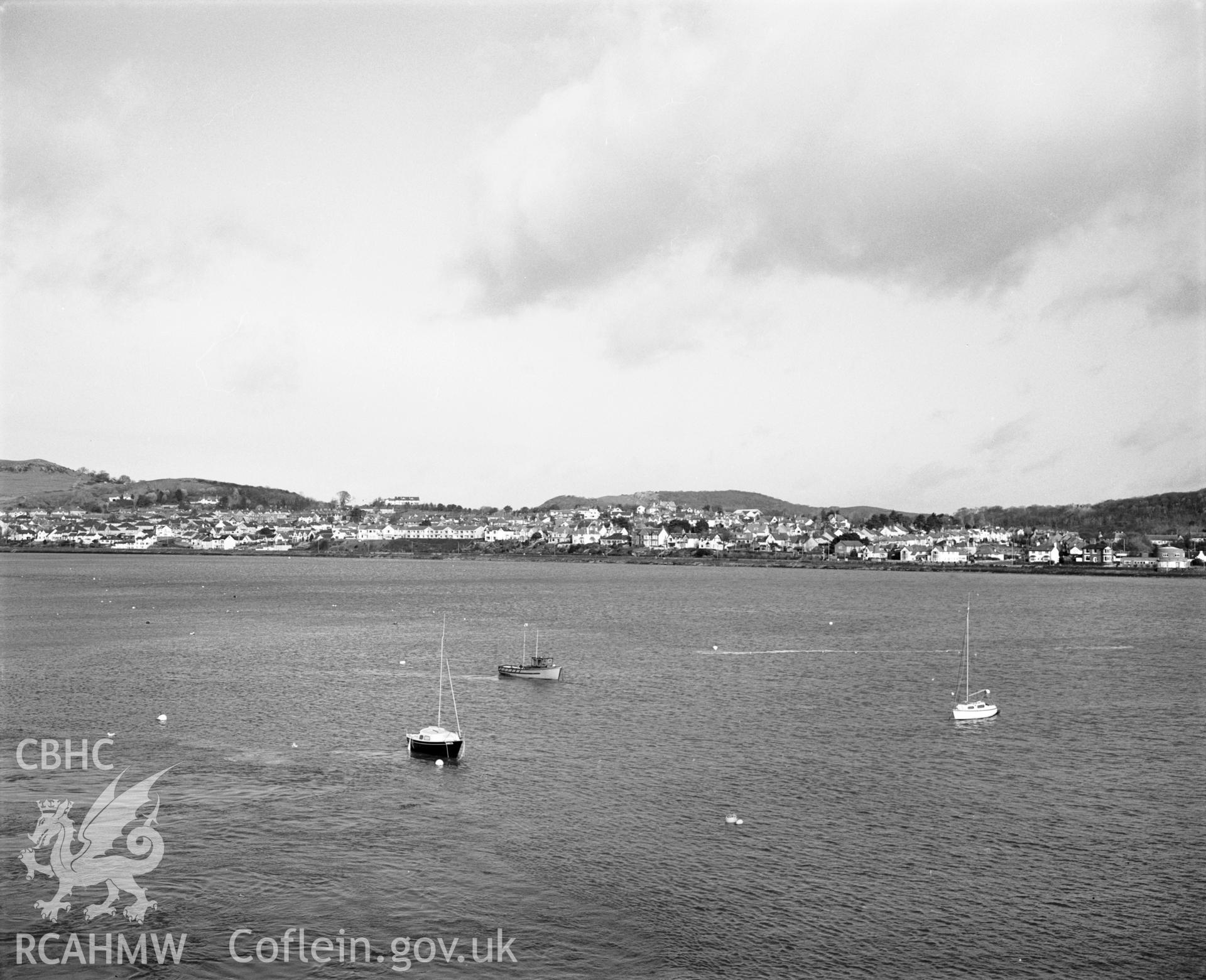 Photographic negative showing distant view of Conwy from the sea; collated by the former Central Office of Information.