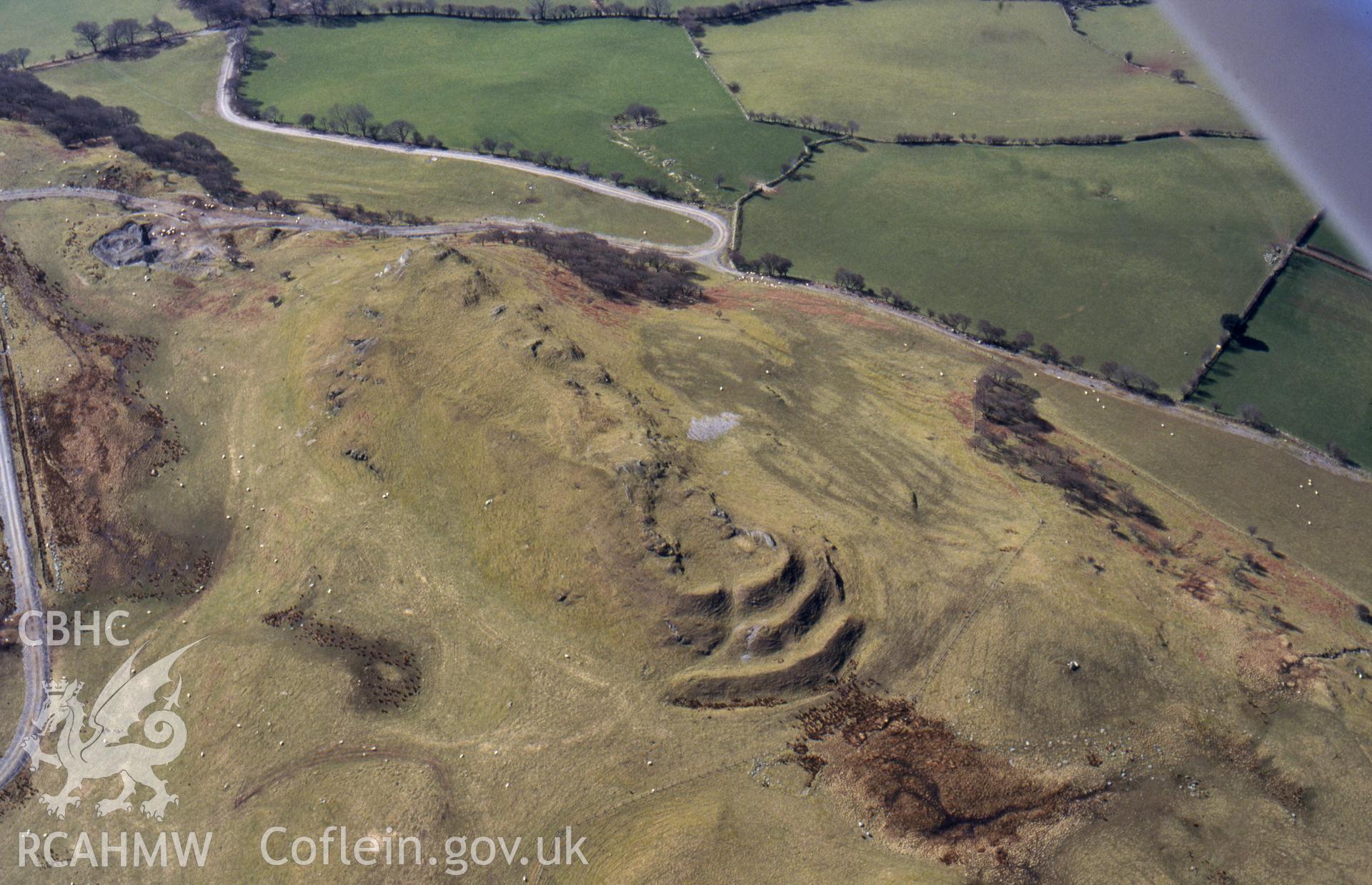 Slide of RCAHMW colour oblique aerial photograph of Pen Y Bannau Hillfort, Nr. Strata Florida, taken by C.R. Musson, 23/3/1995.