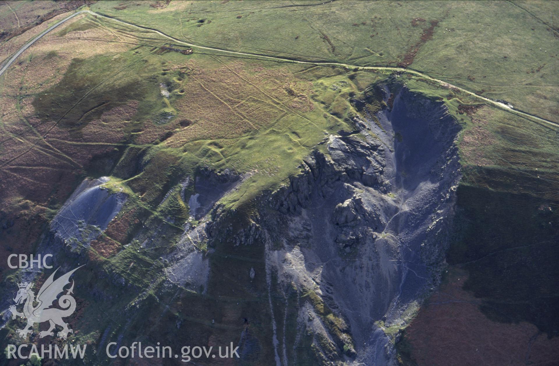 Slide of RCAHMW colour oblique aerial photograph of Craig-y-mwyn Lead Mine, Llanrhaedr-ym-mochnant, taken by C.R. Musson, 2/5/1993.