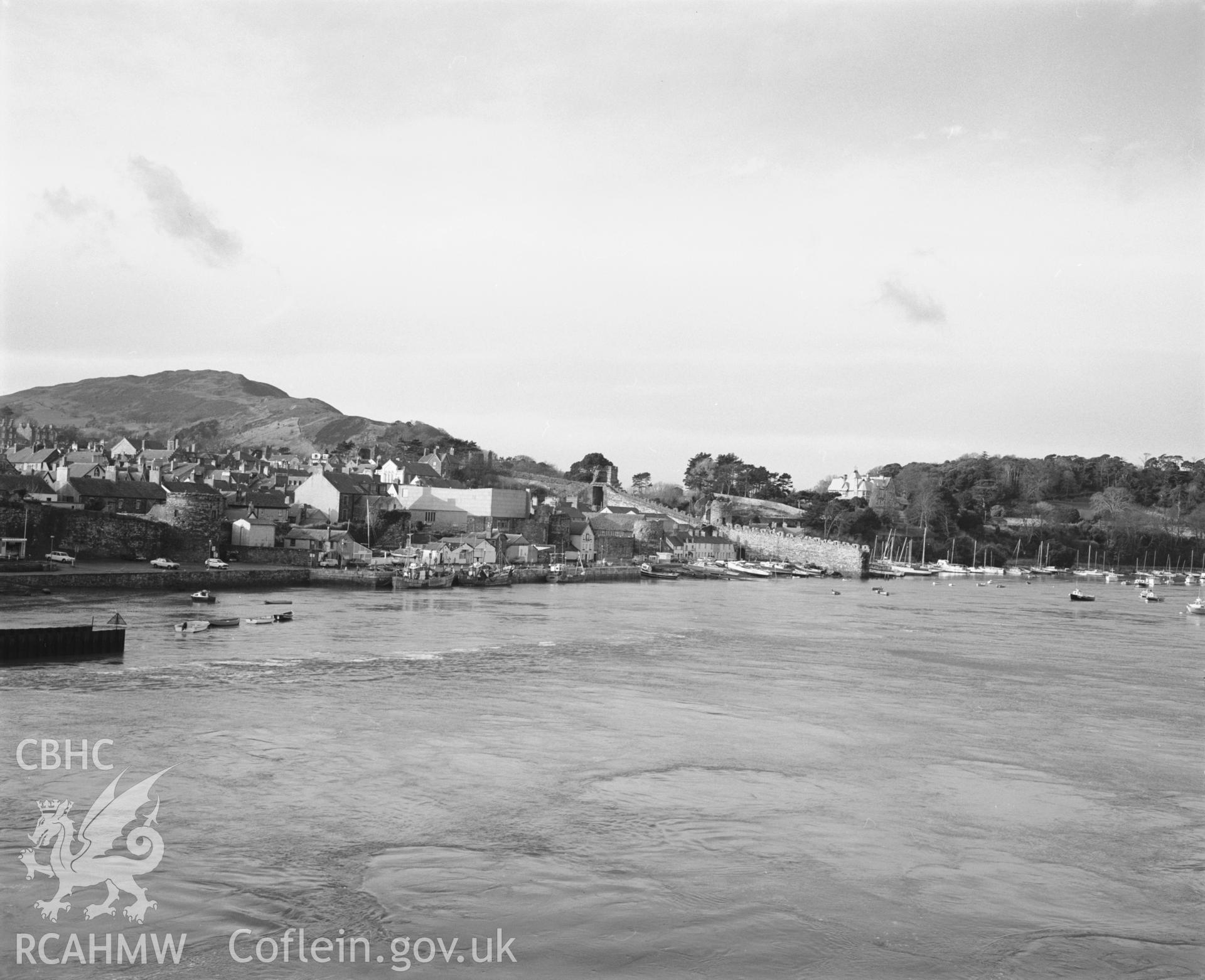 Photographic negative showing distant view of Conwy from the sea; collated by the former Central Office of Information.