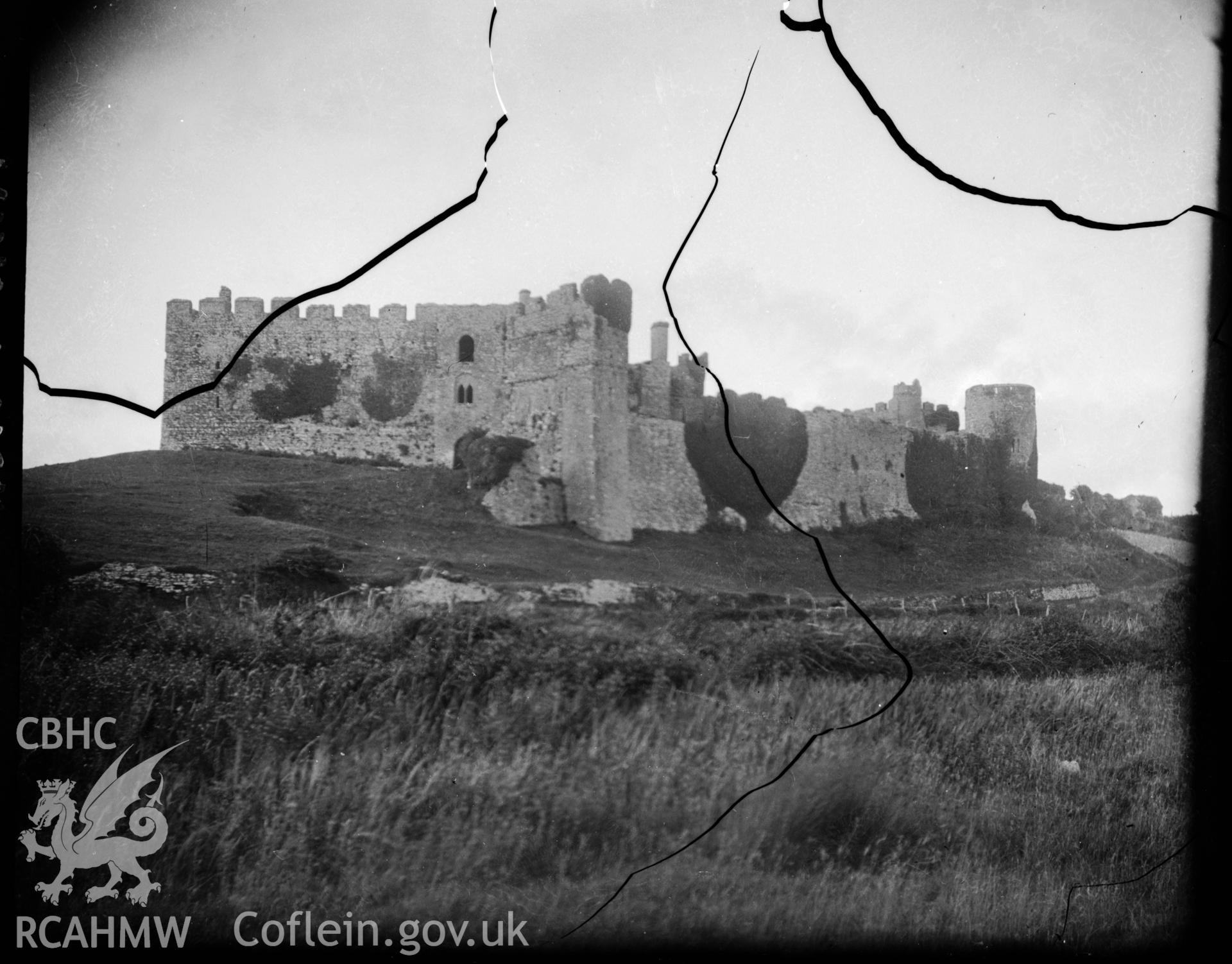 Black and white photo showing Manorbier Castle.