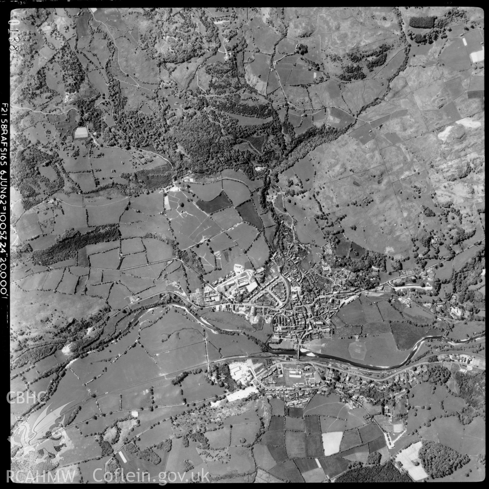 Black and white vertical aerial photograph, taken in 1962 by the RAF, showing the  Dolgellau area at a height of 20,000'