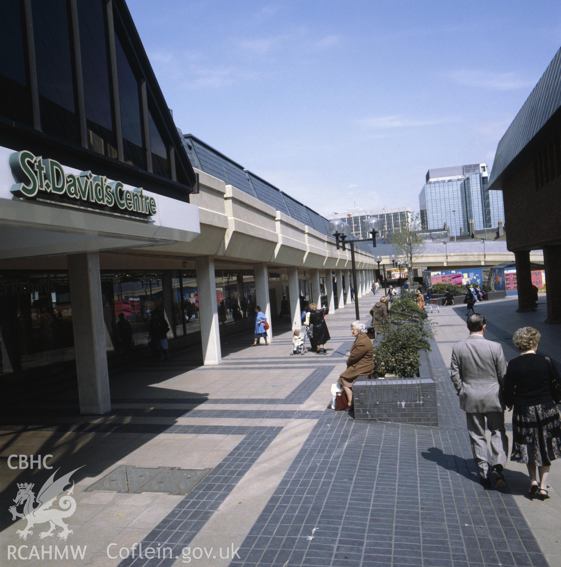 1 colour transparency showing street scene outside St David's Centre, Cardiff with shoppers; collated by the former Central Office of Information.