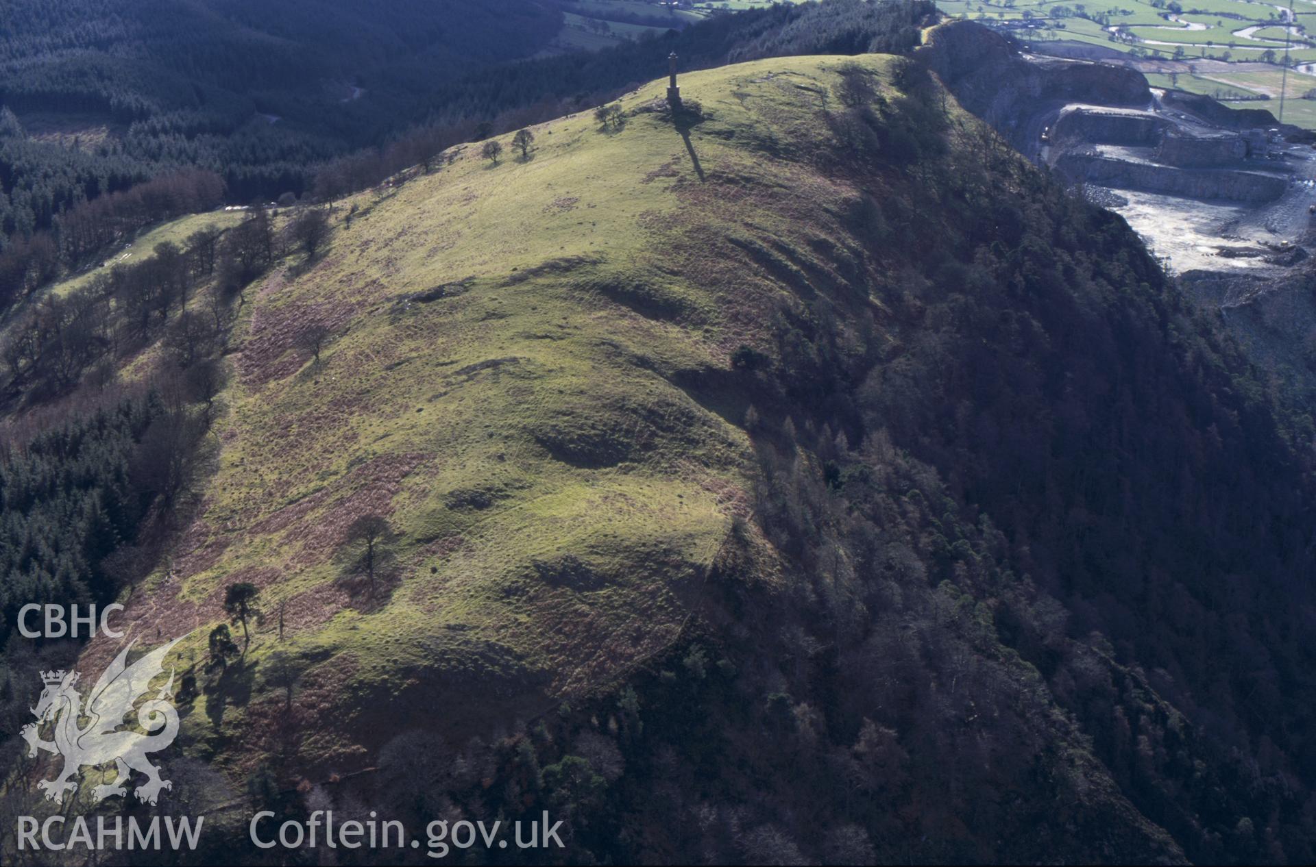 RCAHMW colour oblique aerial photograph of the Breiddin Hillfort taken on 26/02/1995 by C.R. Musson