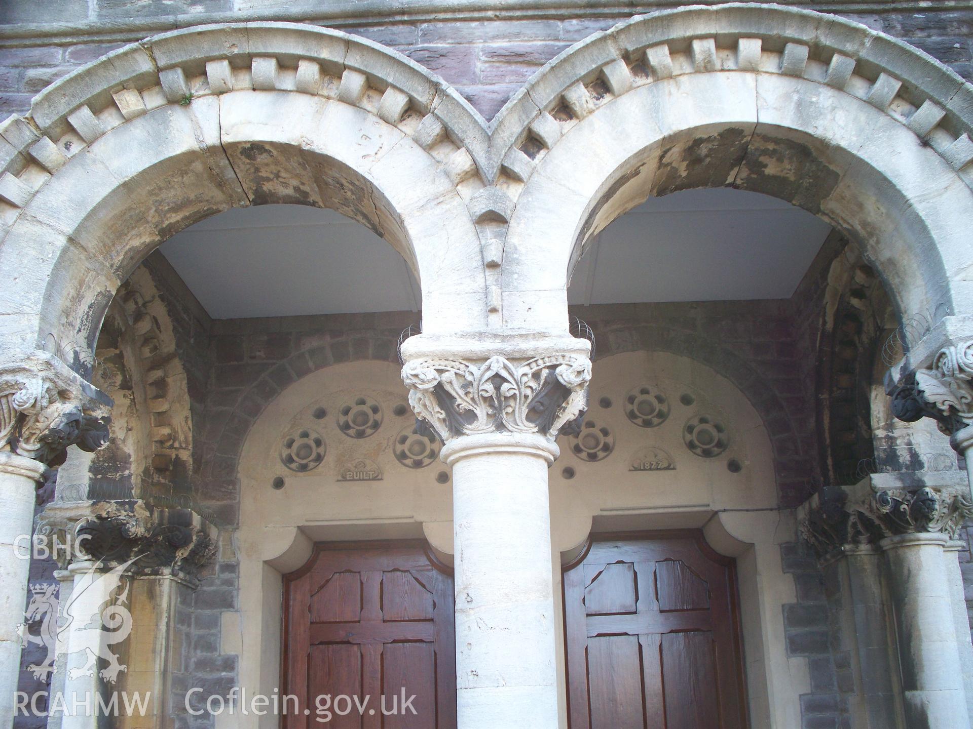 Detail of the twin SE porch arched heads & those of the twin doors.