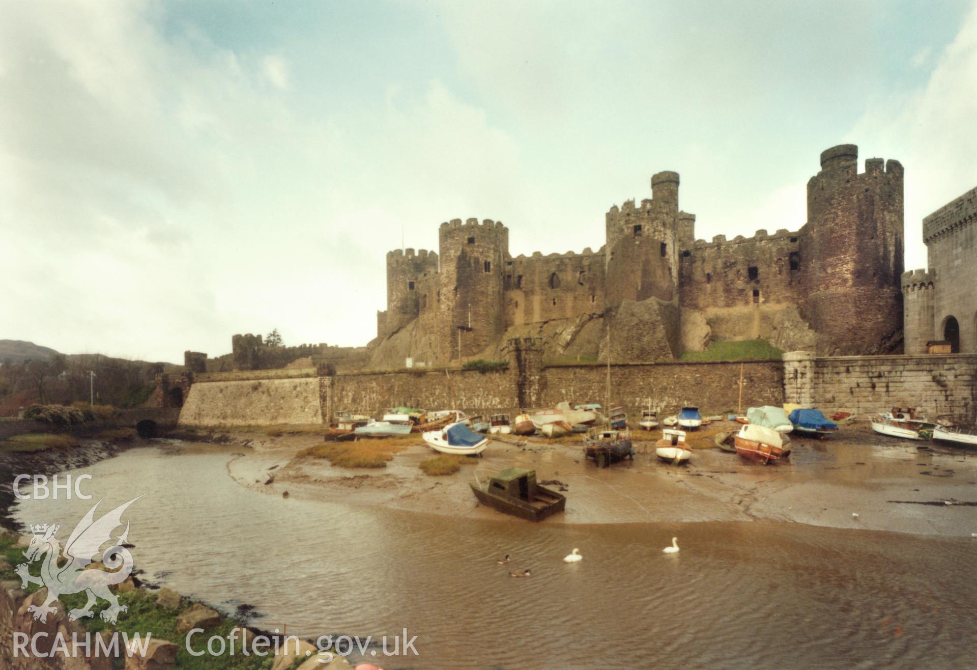 1 of a set of 27 colour prints: print showing view of Conwy castle and boats, collated by the former Central Office of Information.