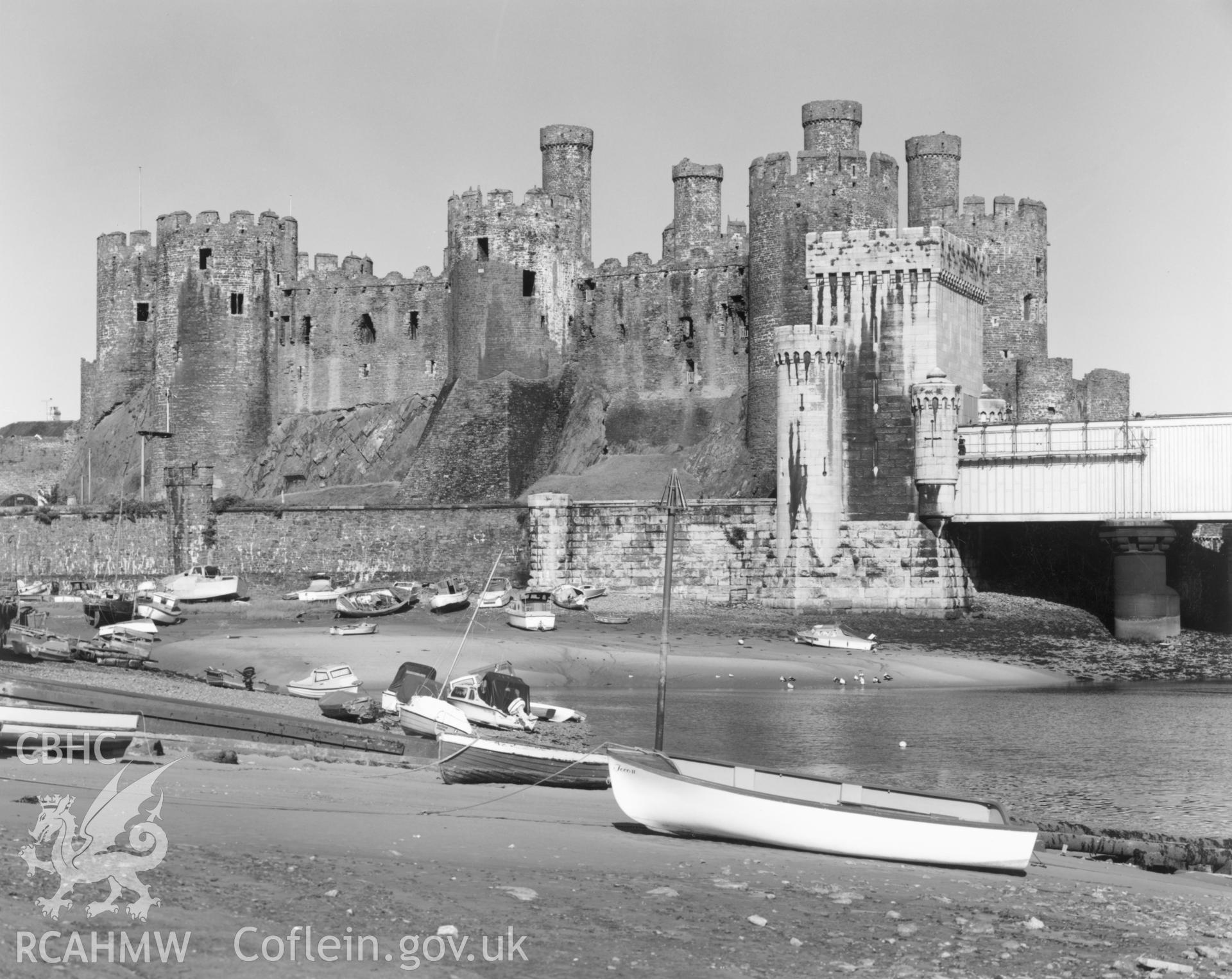 1 b/w print showing view of Conwy castle and boats, collated by the former Central Office of Information.