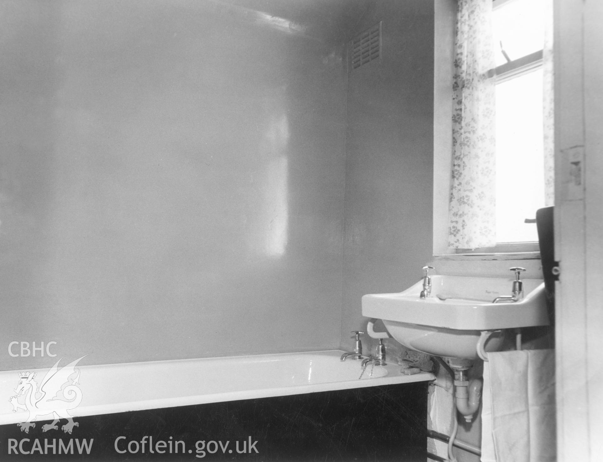 1 b/w print showing interior of house on High Street, Ysbyty Ifan (new bathroom), used as an illustration of the Housing Improvement Grant scheme for exhibitions held at Ministry of Housing stands at agricultural shows (1960); collated by the former Central Office of Information.