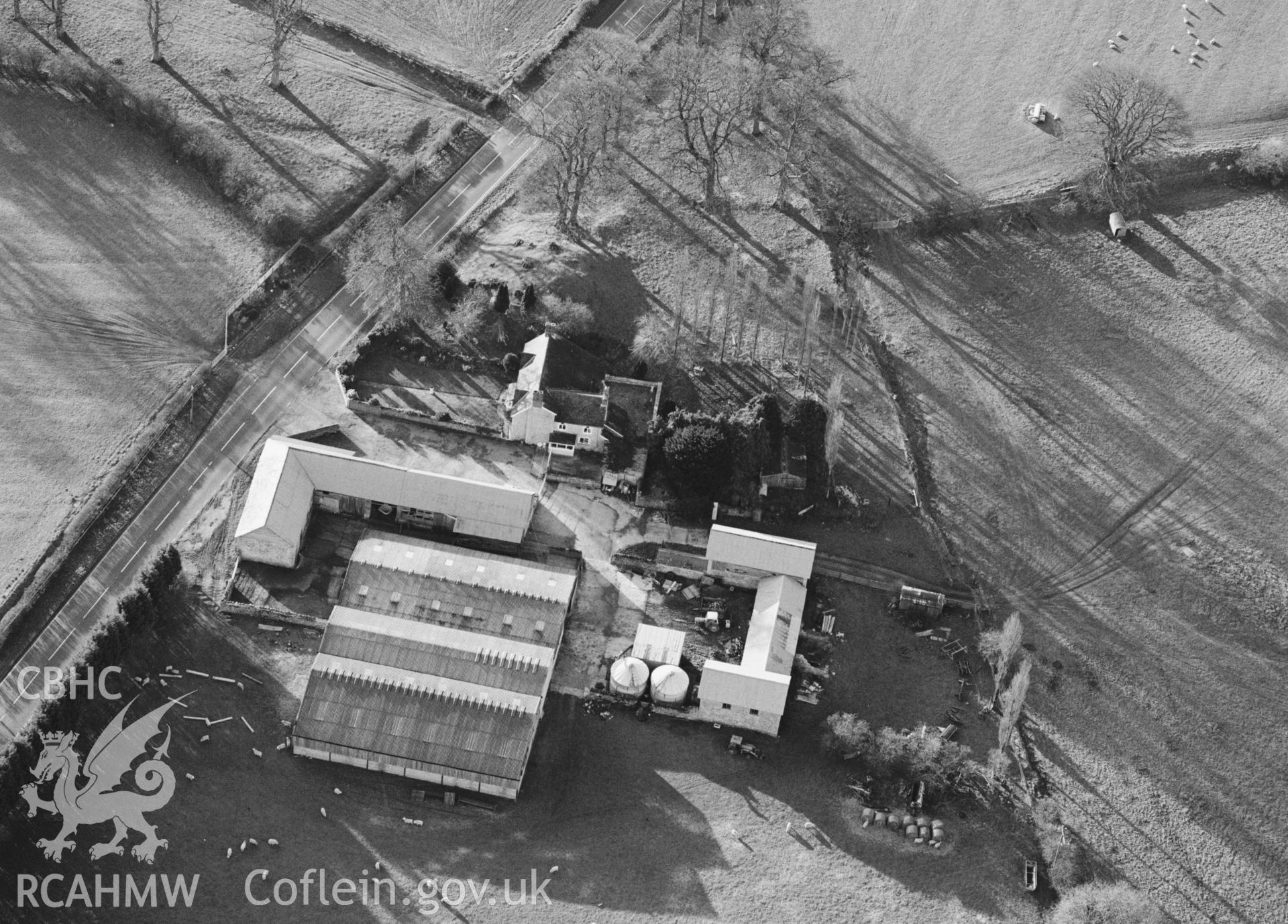 RCAHMW black and white oblique aerial photograph of Knapp Mount, taken by C R Musson, 27/12/1996.