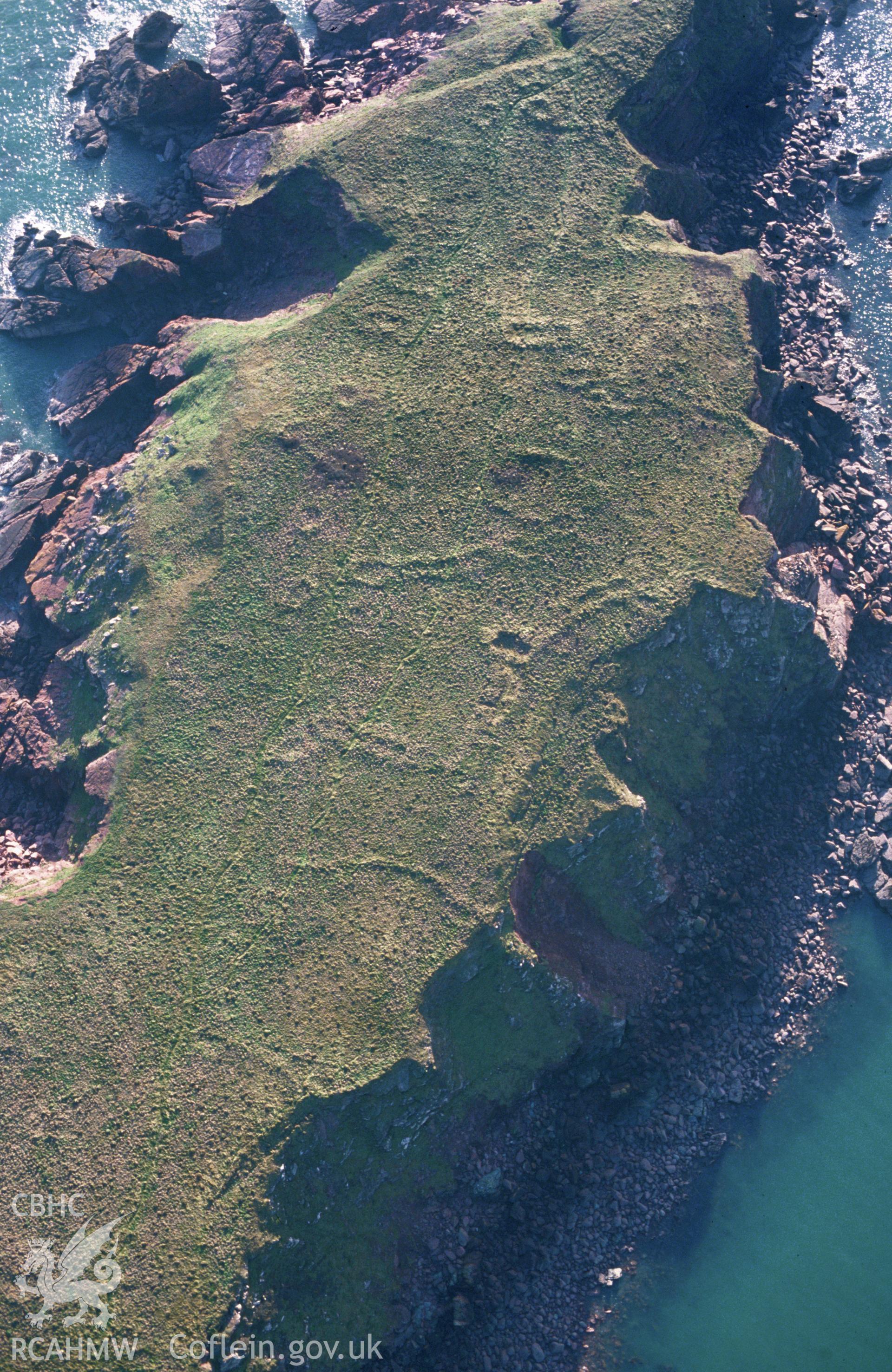 Slide of RCAHMW colour oblique aerial photograph of Gateholm Island, taken by C.R. Musson, 23/2/1993.