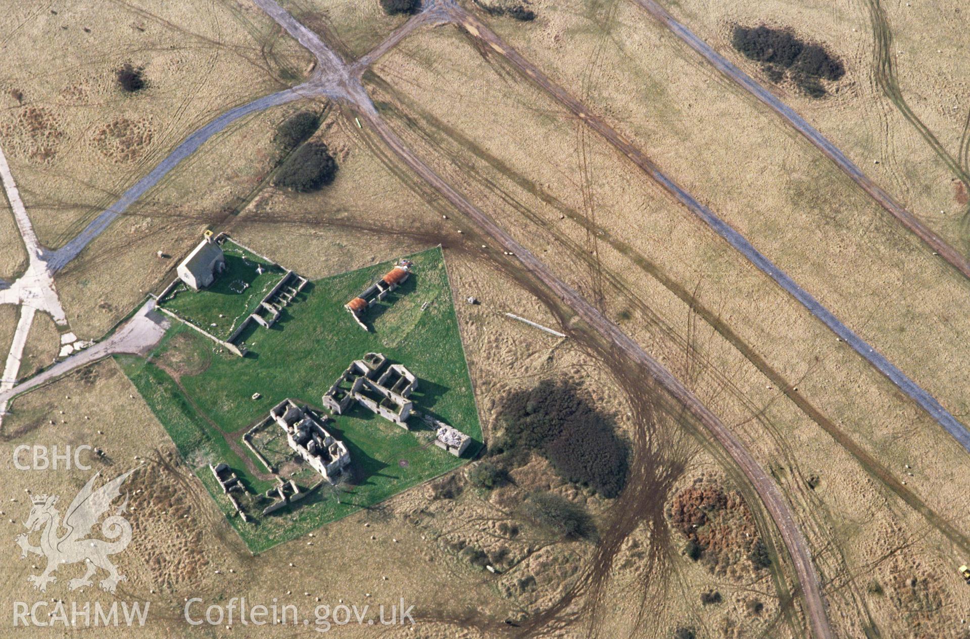 Slide of RCAHMW colour oblique aerial photograph of Flimston Farmhouse, taken by C.R. Musson, 28/2/1993.