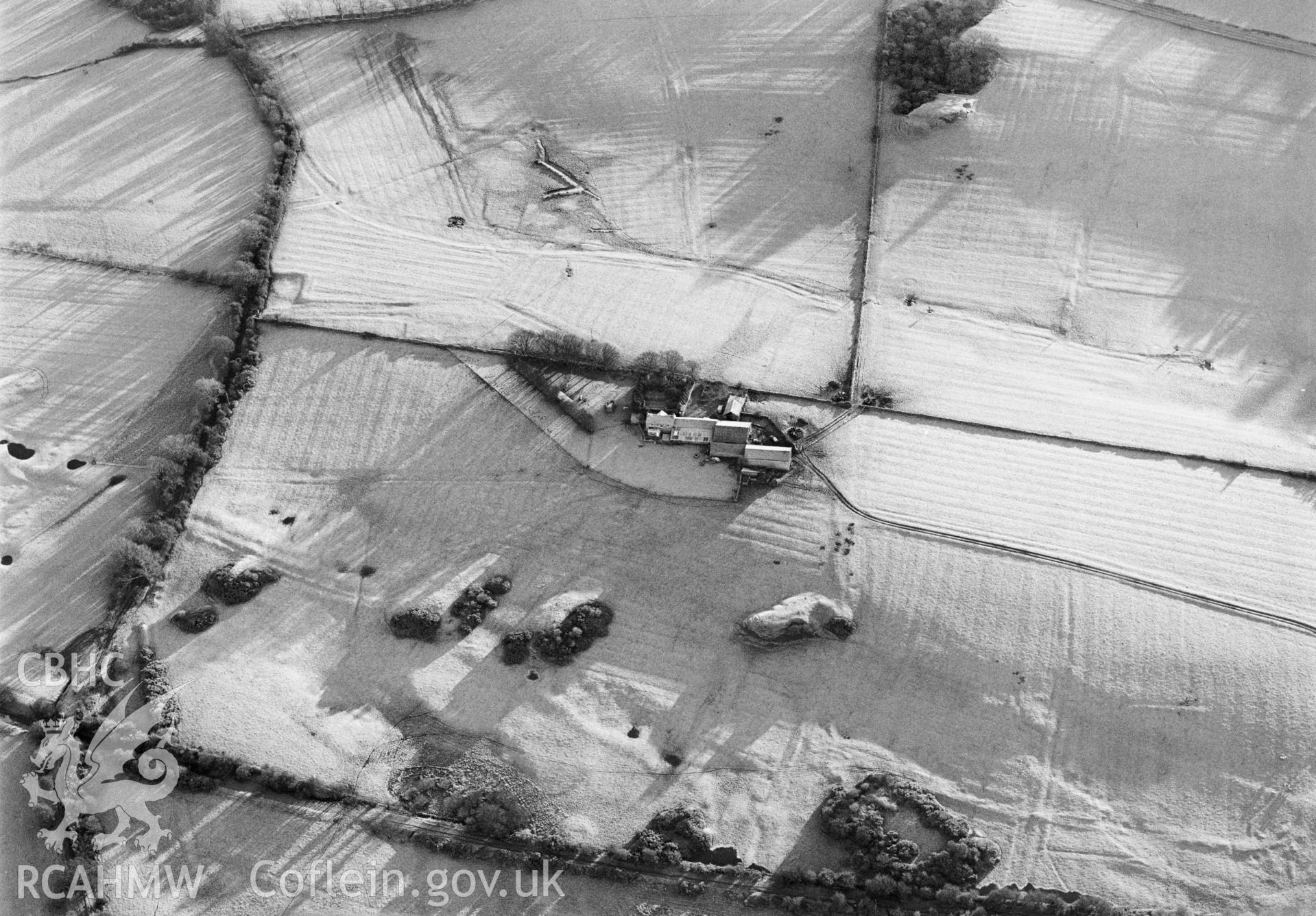 RCAHMW Black and white oblique aerial photograph of Ty-mawr Coal Workings, Llanfihangel Ysgeifiog, taken on 10/01/1999 by Toby Driver
