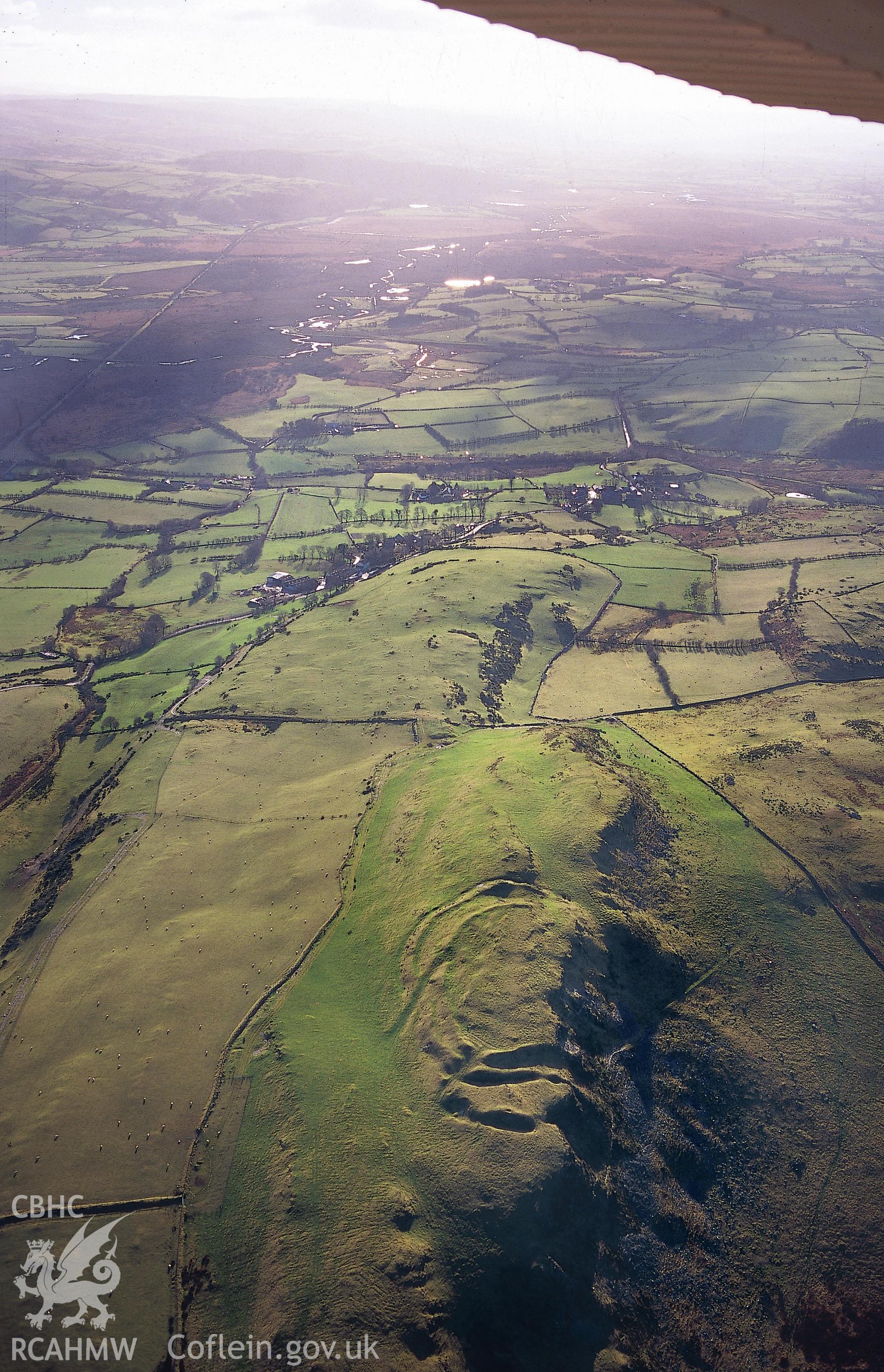 Slide of RCAHMW colour oblique aerial photograph of Pen-y-ffrwyd Llwyd Camp,  Craig Ystradmeurig, N. Of Ystradmeurig, taken by T.G. Driver, 4/12/1998.