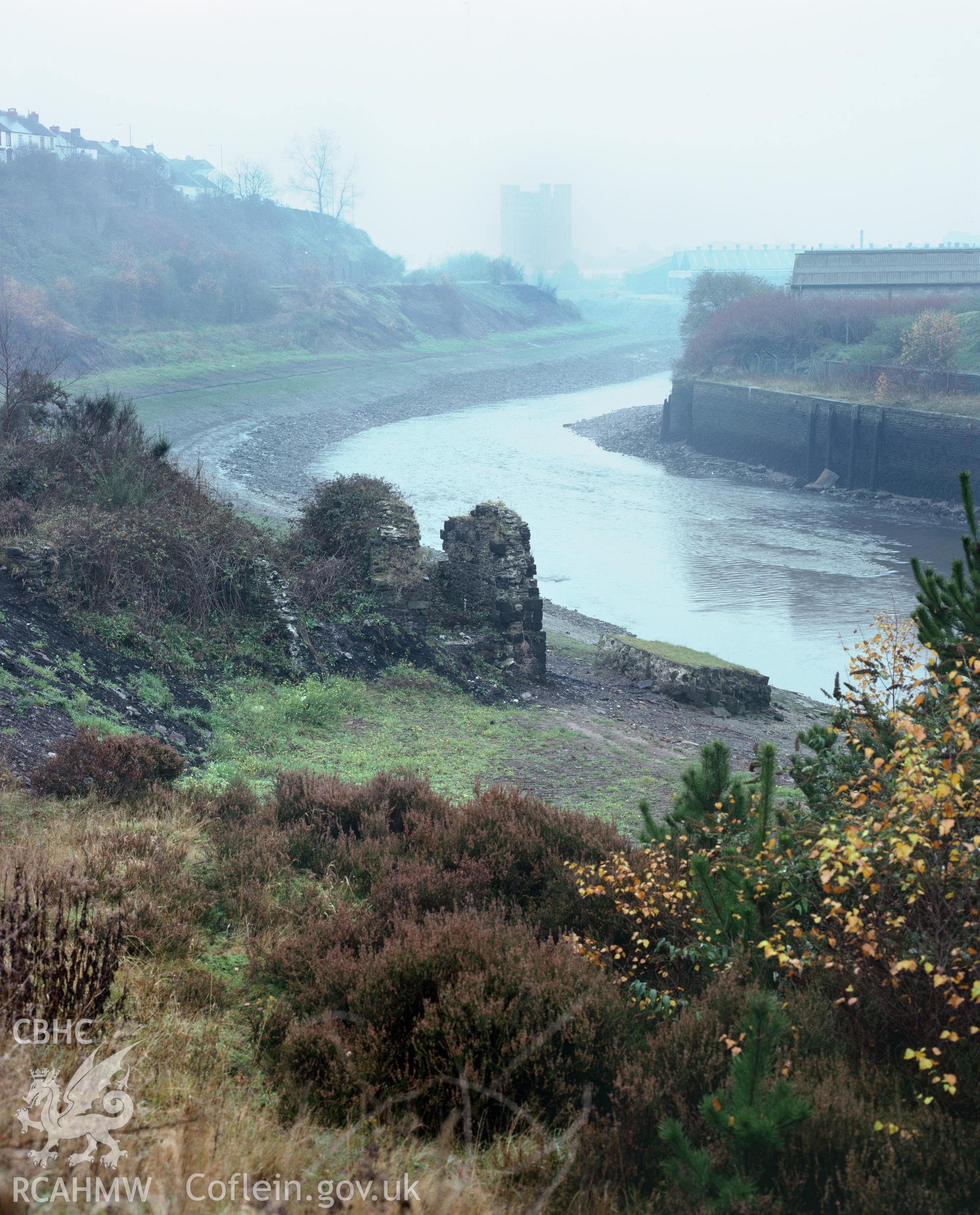 RCAHMW colour transparency showing the tipping staithes on Smith's Canal, Swansea, taken by Iain Wright, c.1981