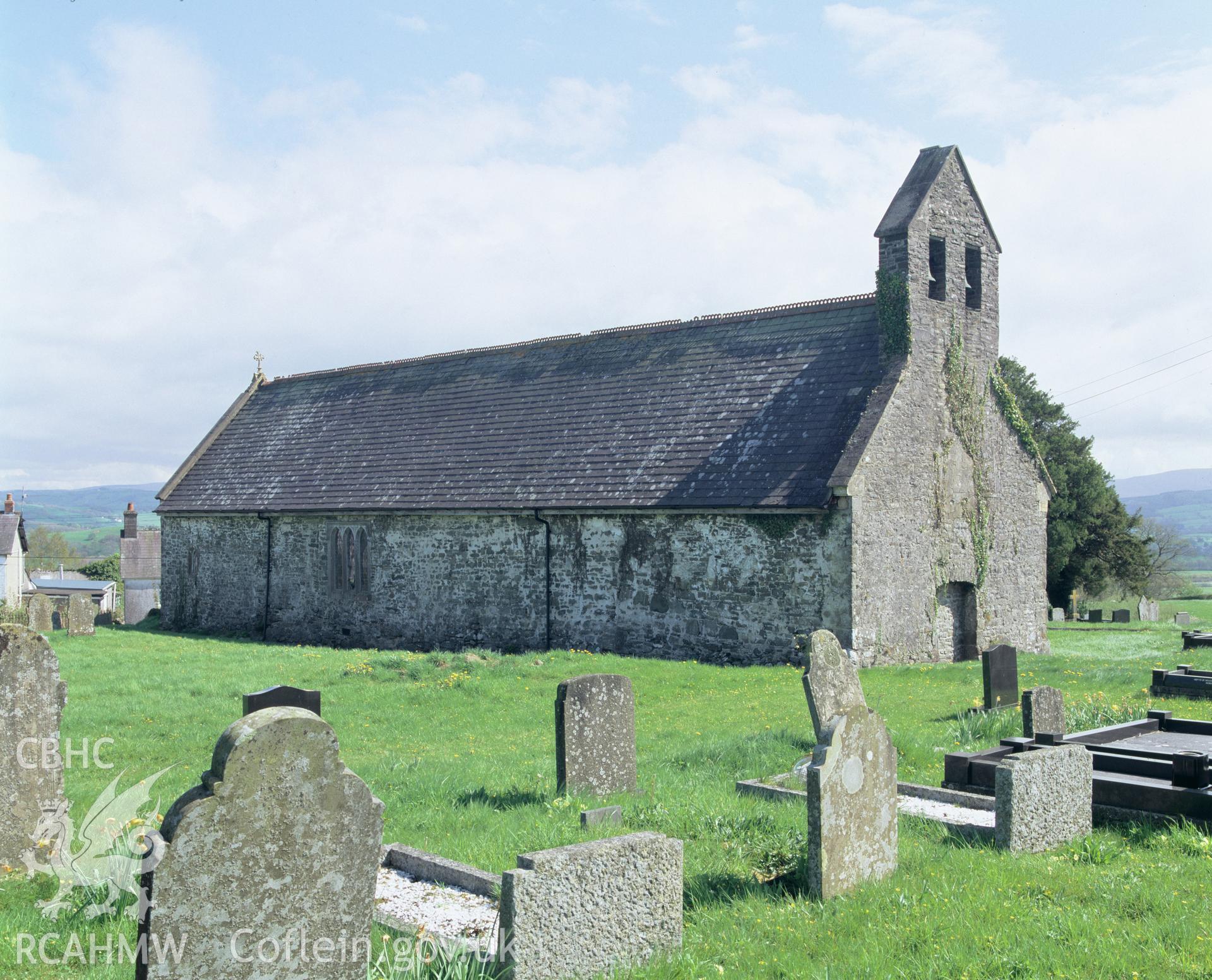 Colour transparency showing an exterior  view of St Sadwrns Church, Llansadwrn, produced by Iain Wright, June 2004.