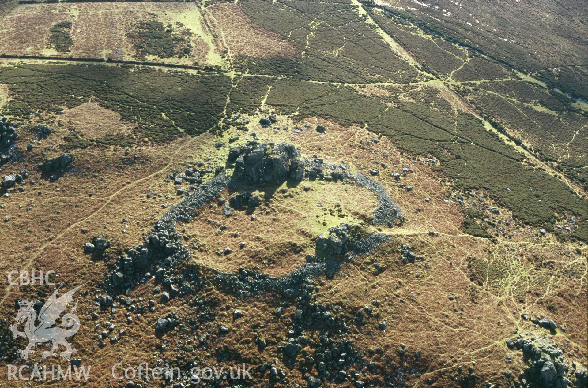 RCAHMW colour slide oblique aerial photograph of Carn Ffoi, Newport, taken by C.R.Musson on the 27/02/1996