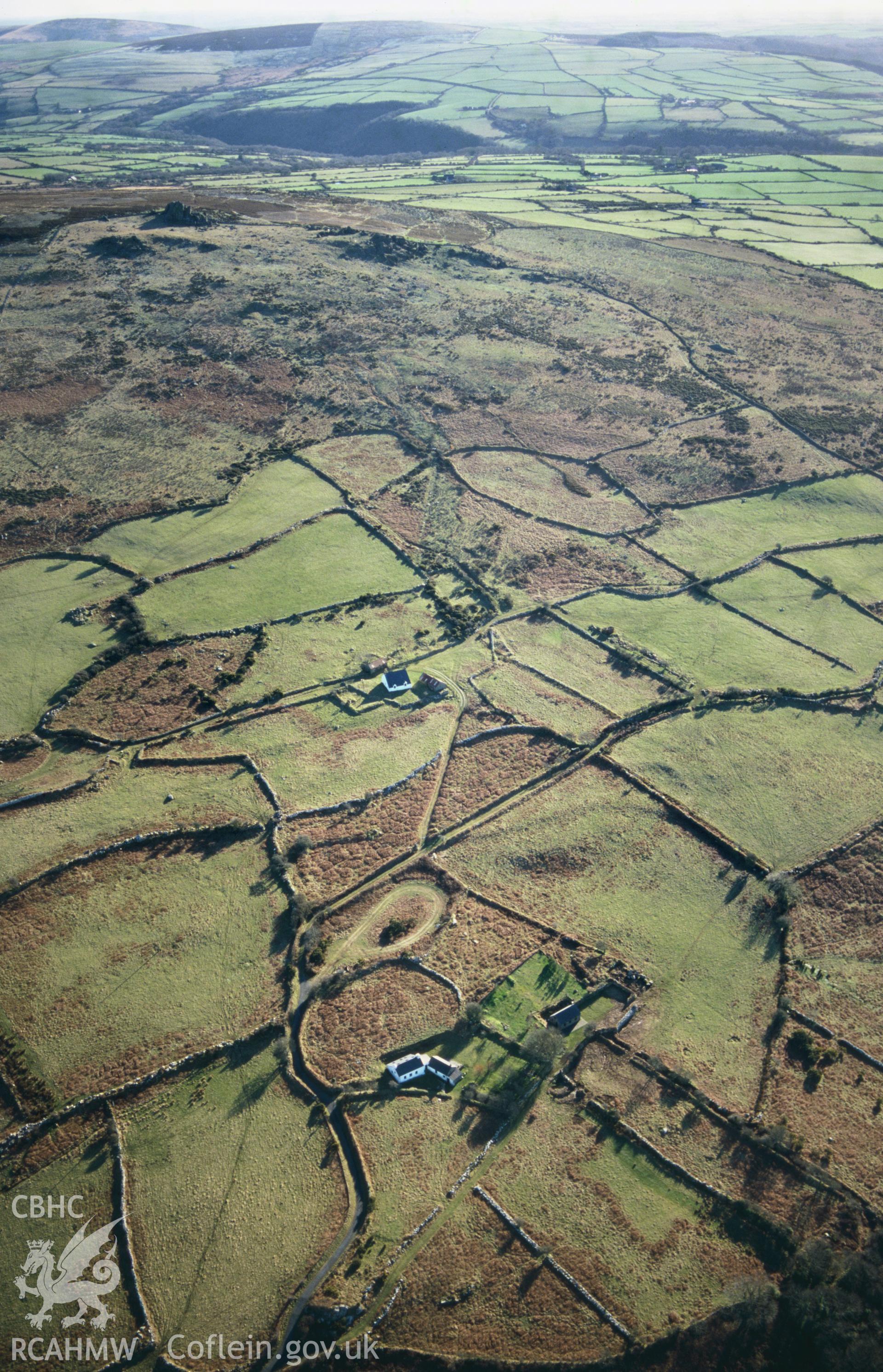 Slide of RCAHMW colour oblique aerial photograph of Bryn Hyfryd Settlement Features, taken by Toby Driver, 2004.